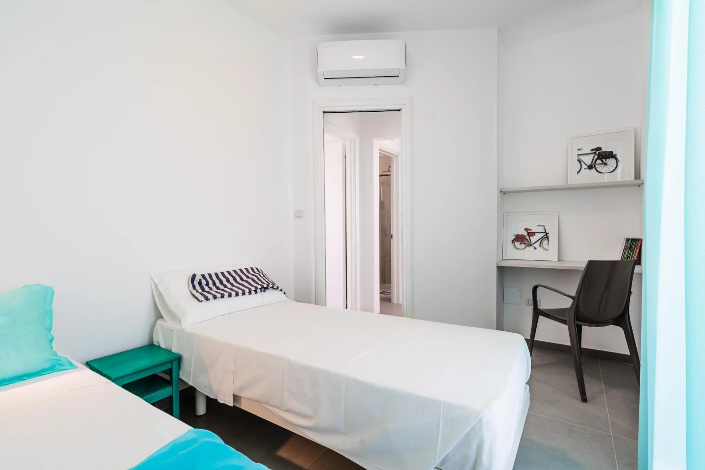 Bed in SMERALDO RESIDENCE