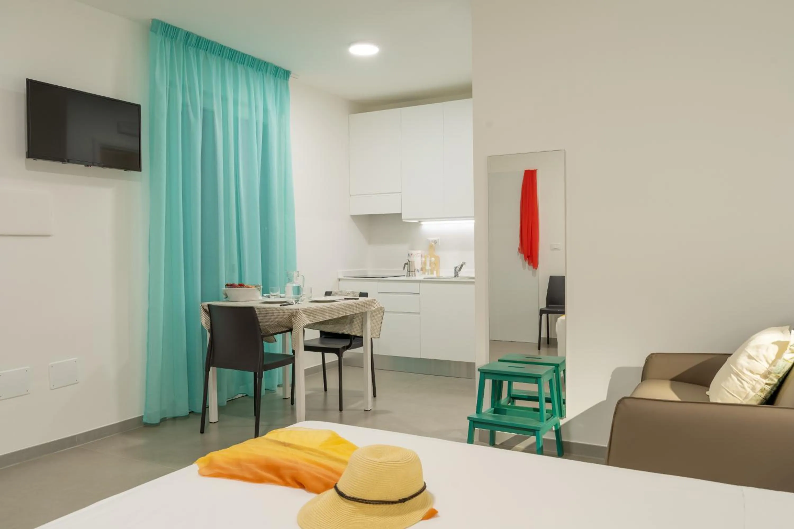 Bed in SMERALDO RESIDENCE