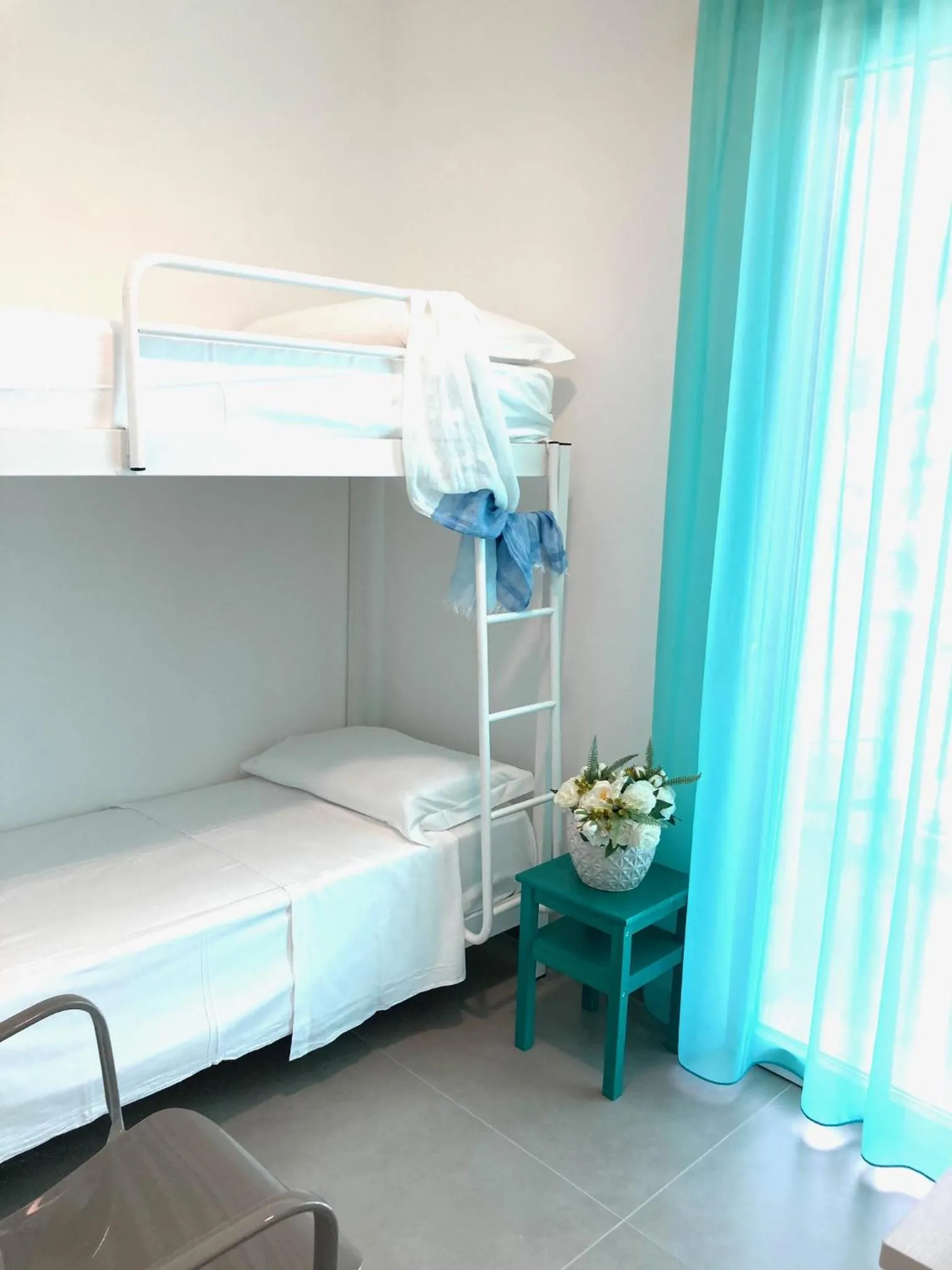 Bed in SMERALDO RESIDENCE