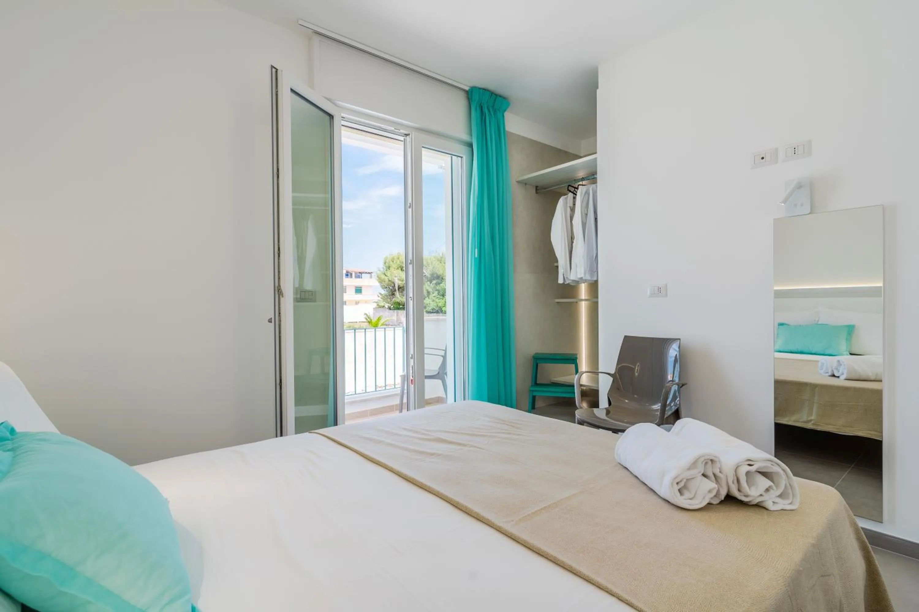 Bed in SMERALDO RESIDENCE