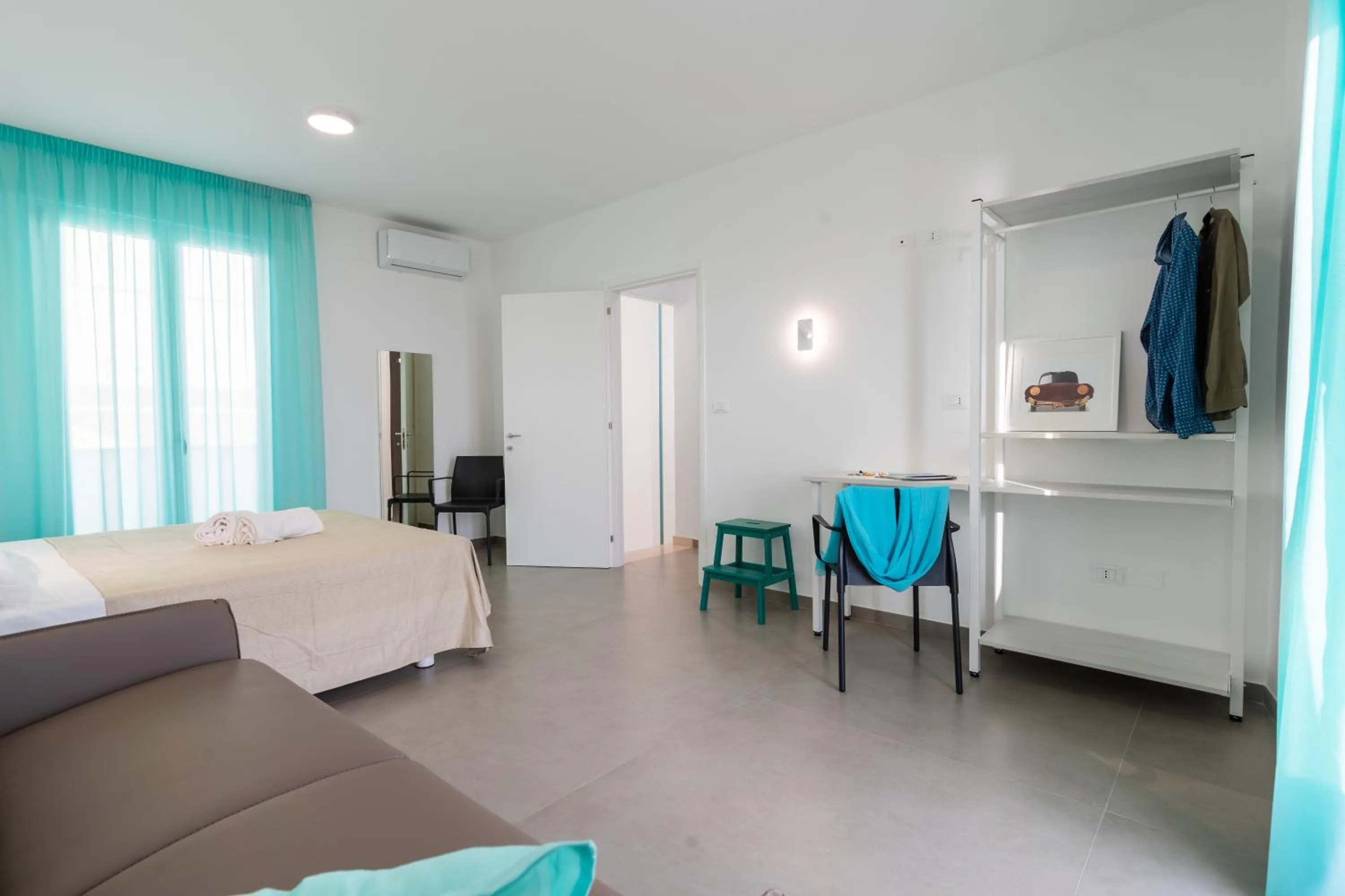 Bed in SMERALDO RESIDENCE