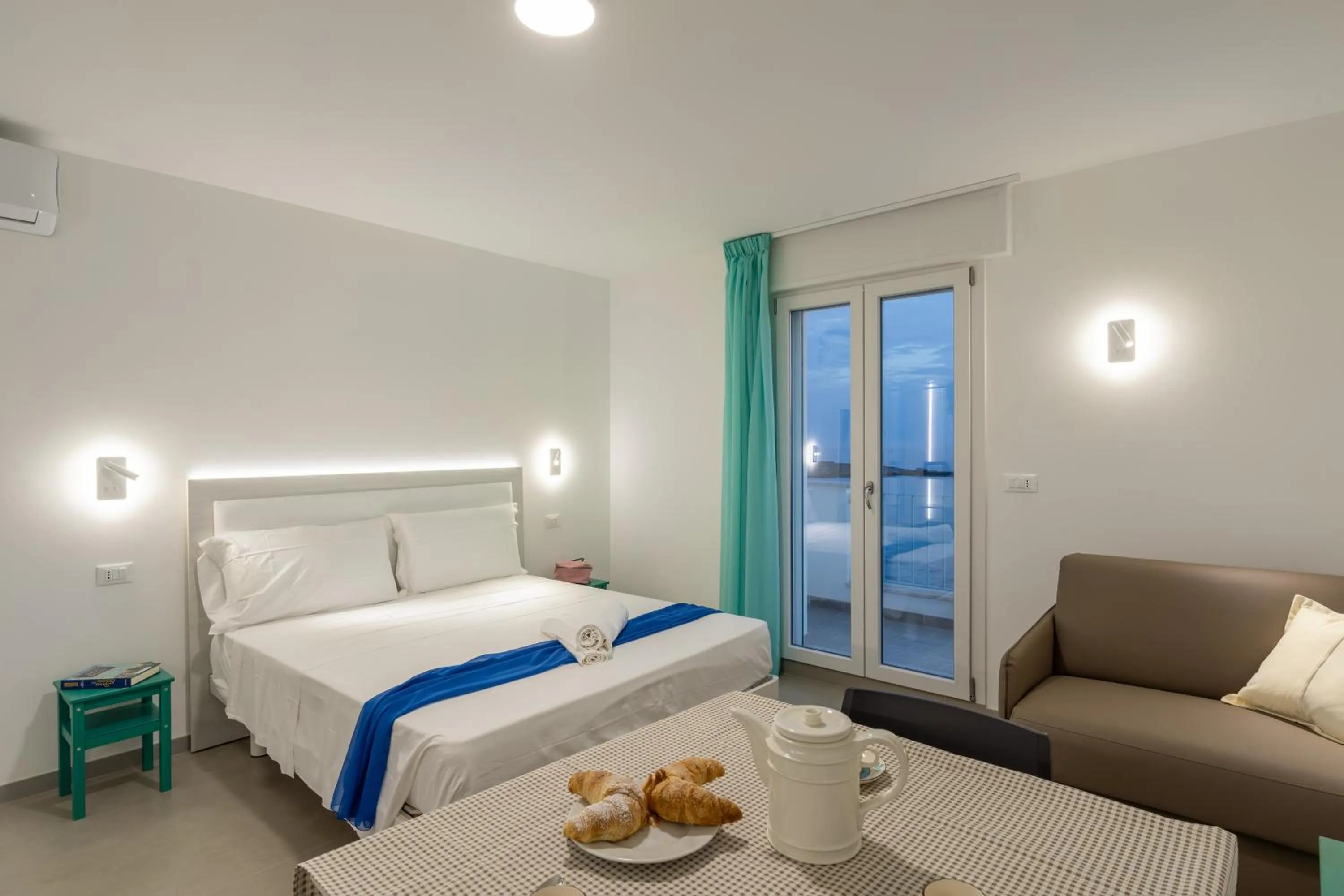 Bed in SMERALDO RESIDENCE