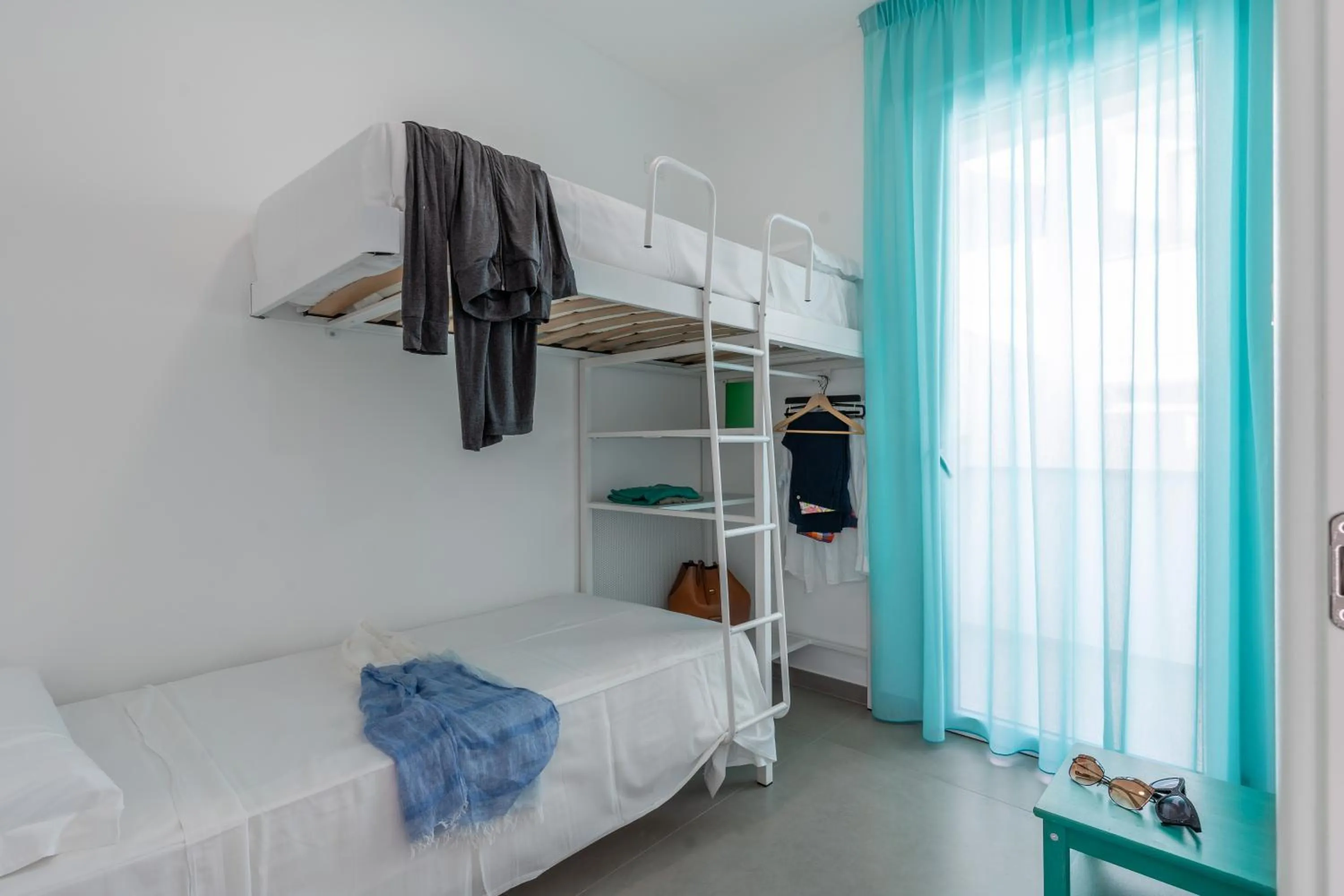 Bed in SMERALDO RESIDENCE