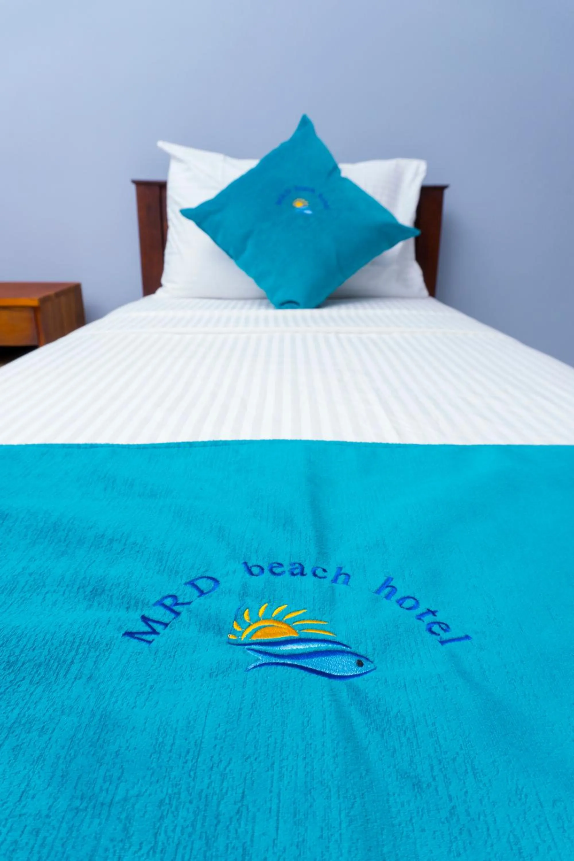 Bed in MRD Beach Hotel