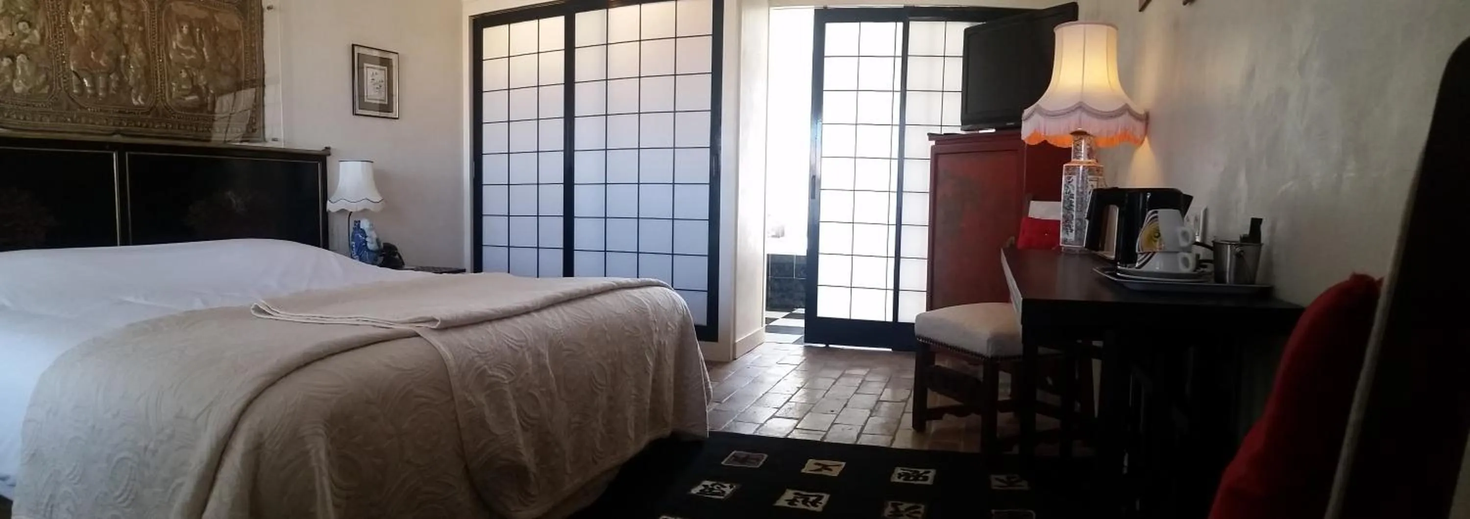 Photo of the whole room, Bed in Le Manoir de l'antiquité