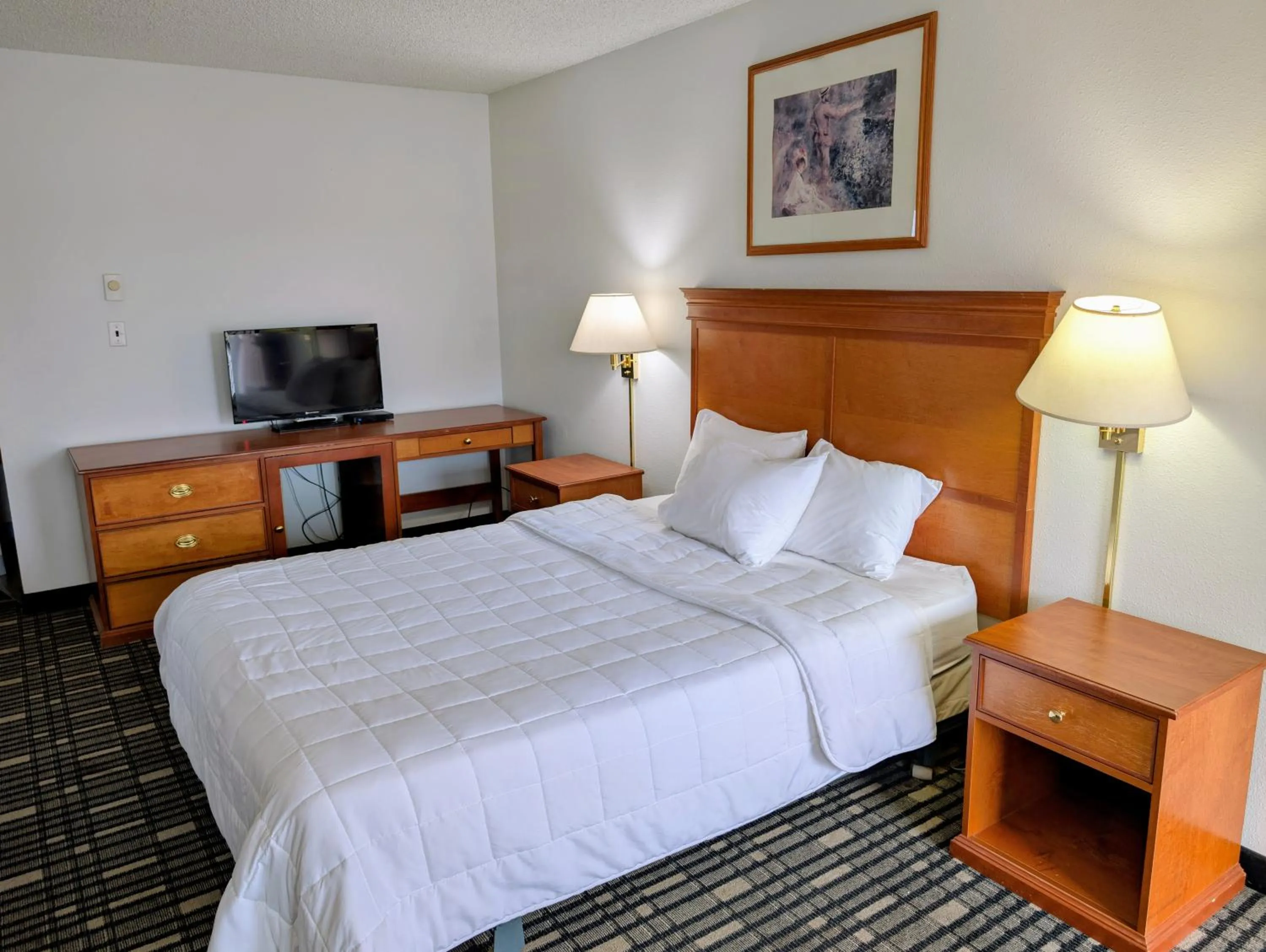 Bed in Ponderosa Motel