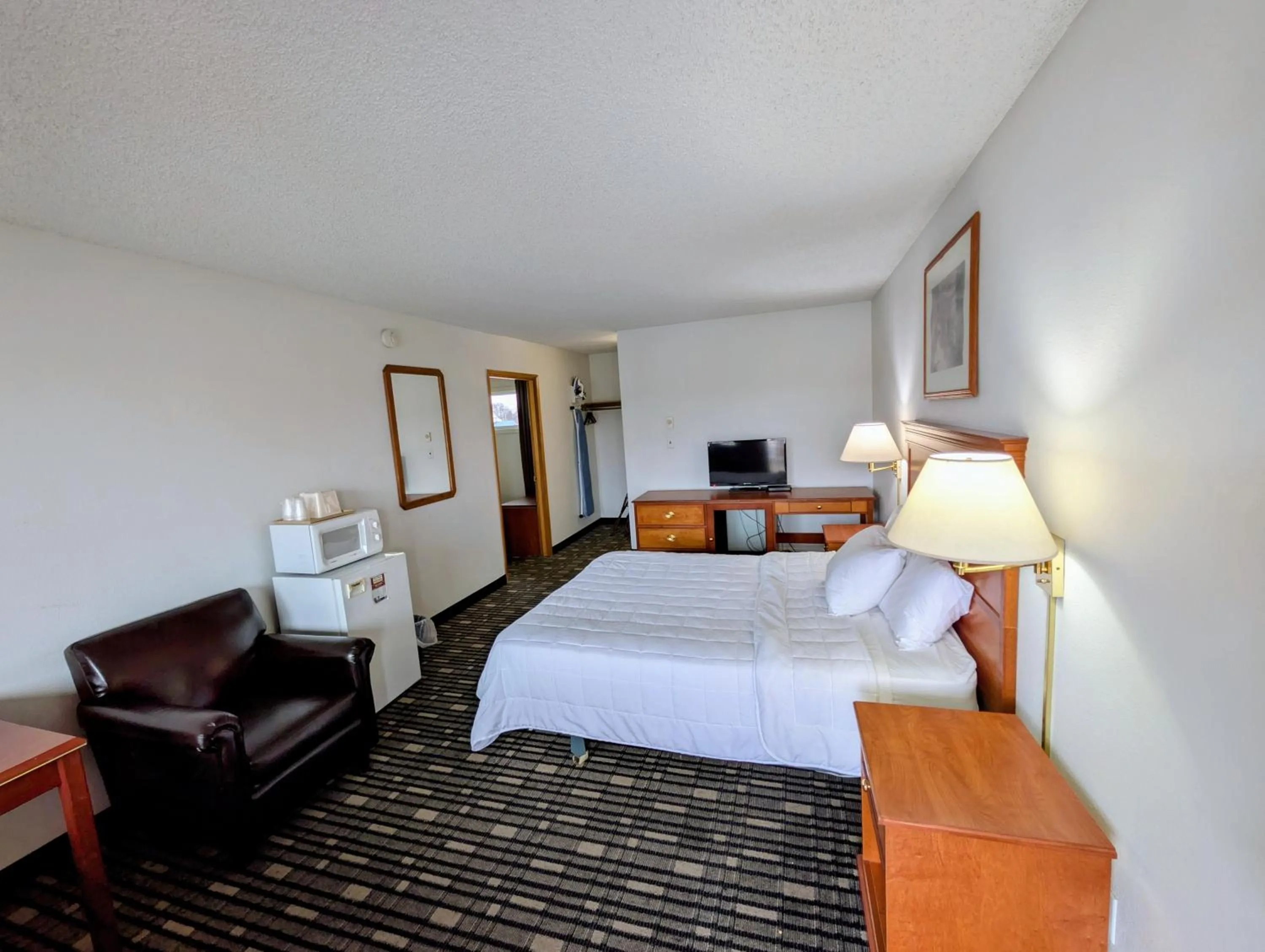 Bed in Ponderosa Motel