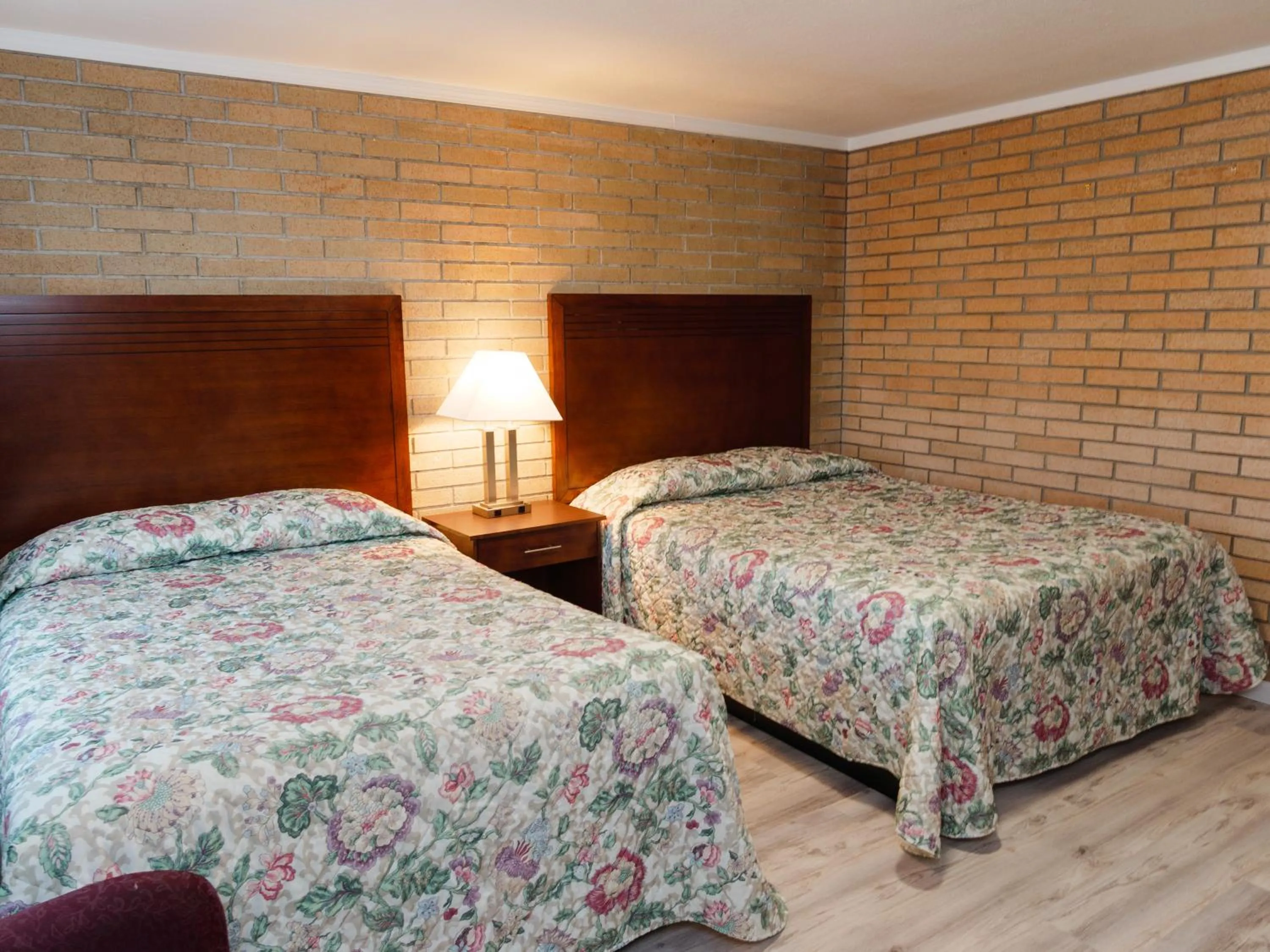 Bed in Sweet Home Inn