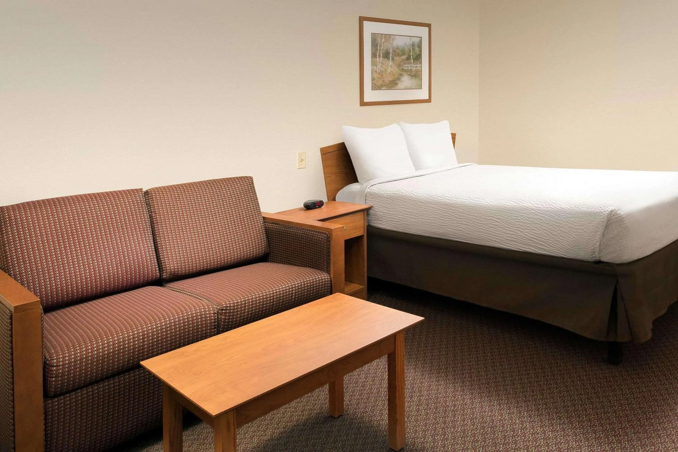 Photo of the whole room, Bed in WoodSpring Suites Midland