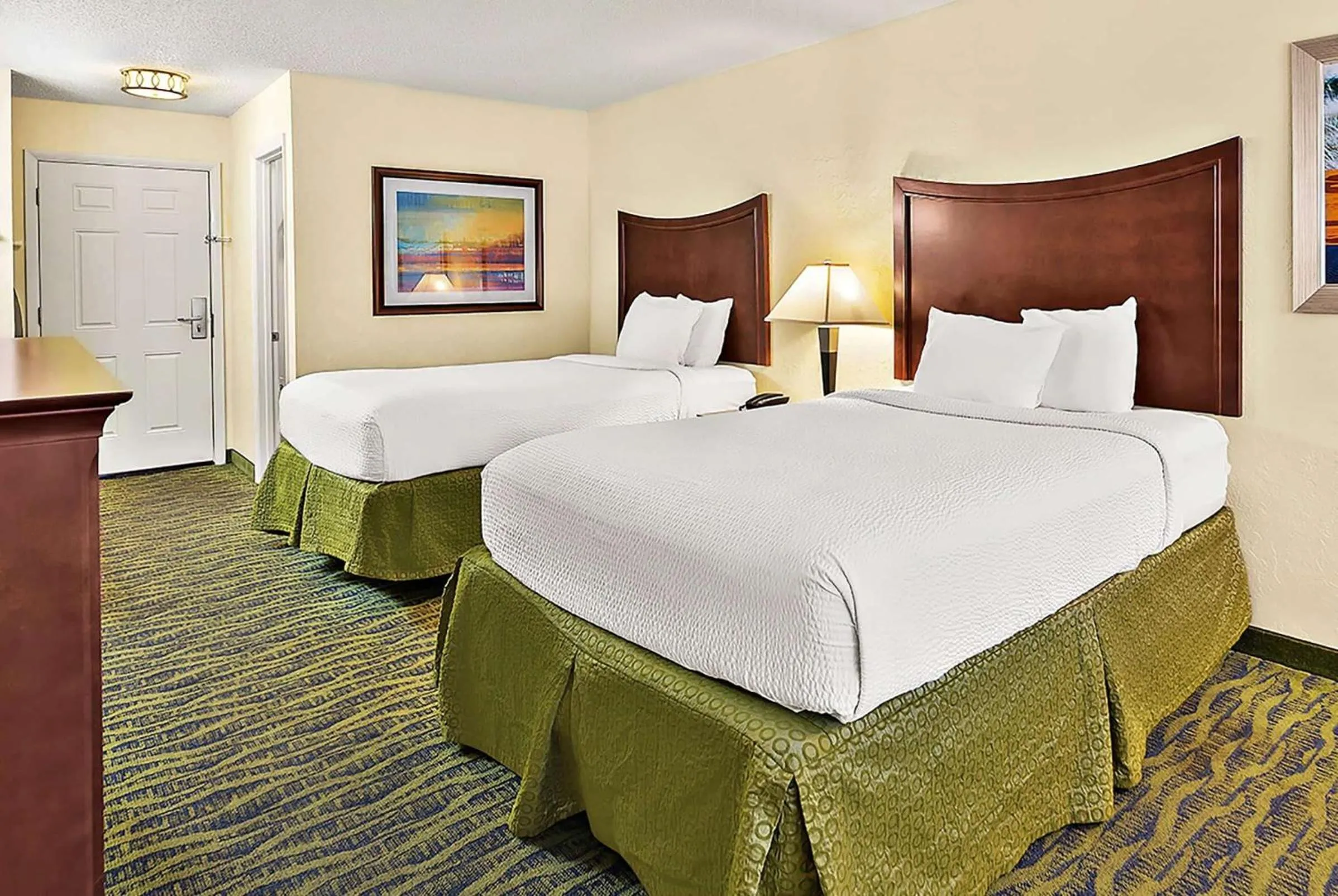 Photo of the whole room, Bed in PaddleTail Waterfront Lodge, Trademark Collection by Wyndham