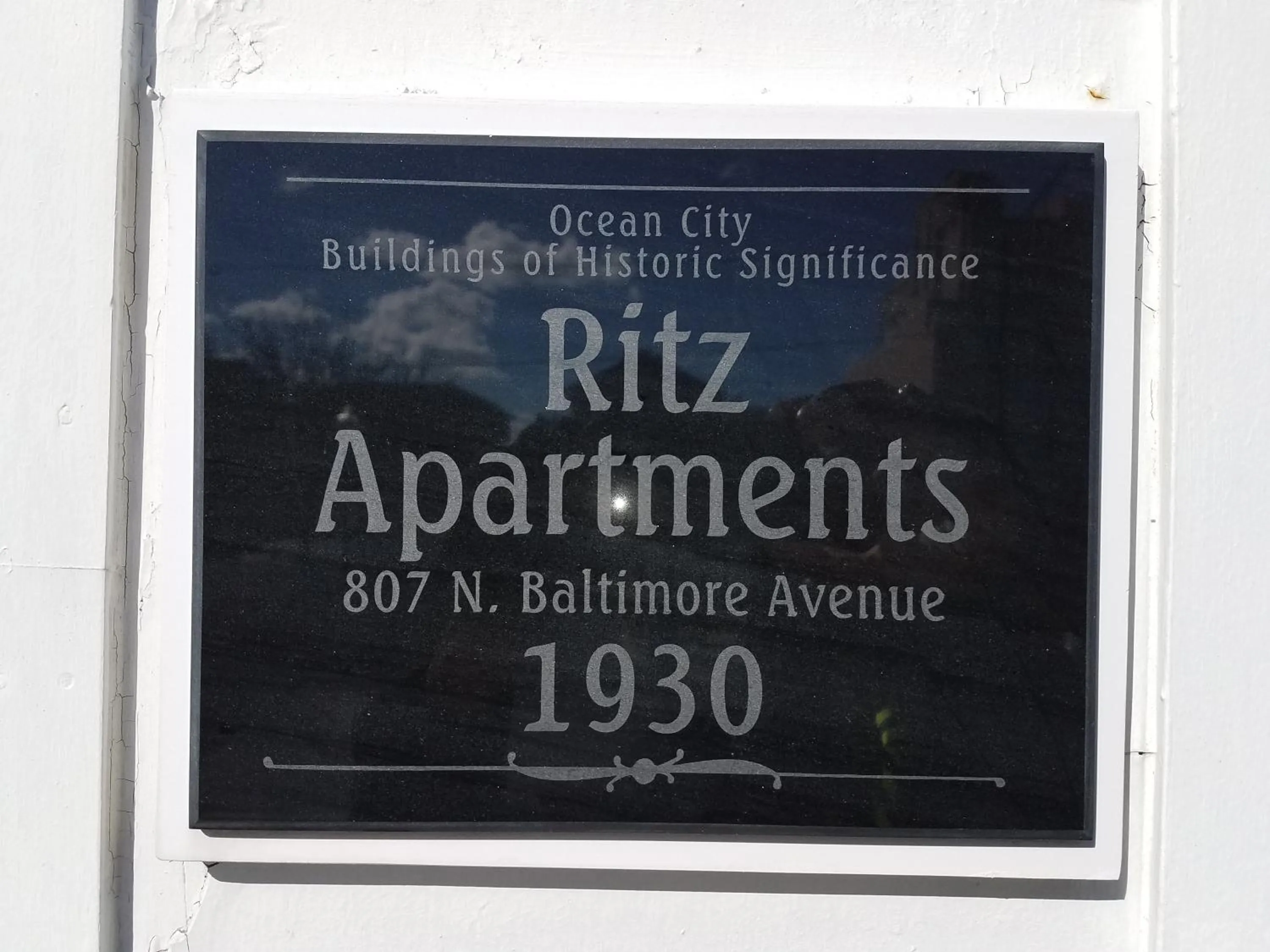 Property logo or sign in The Admiral Hotel/Motel