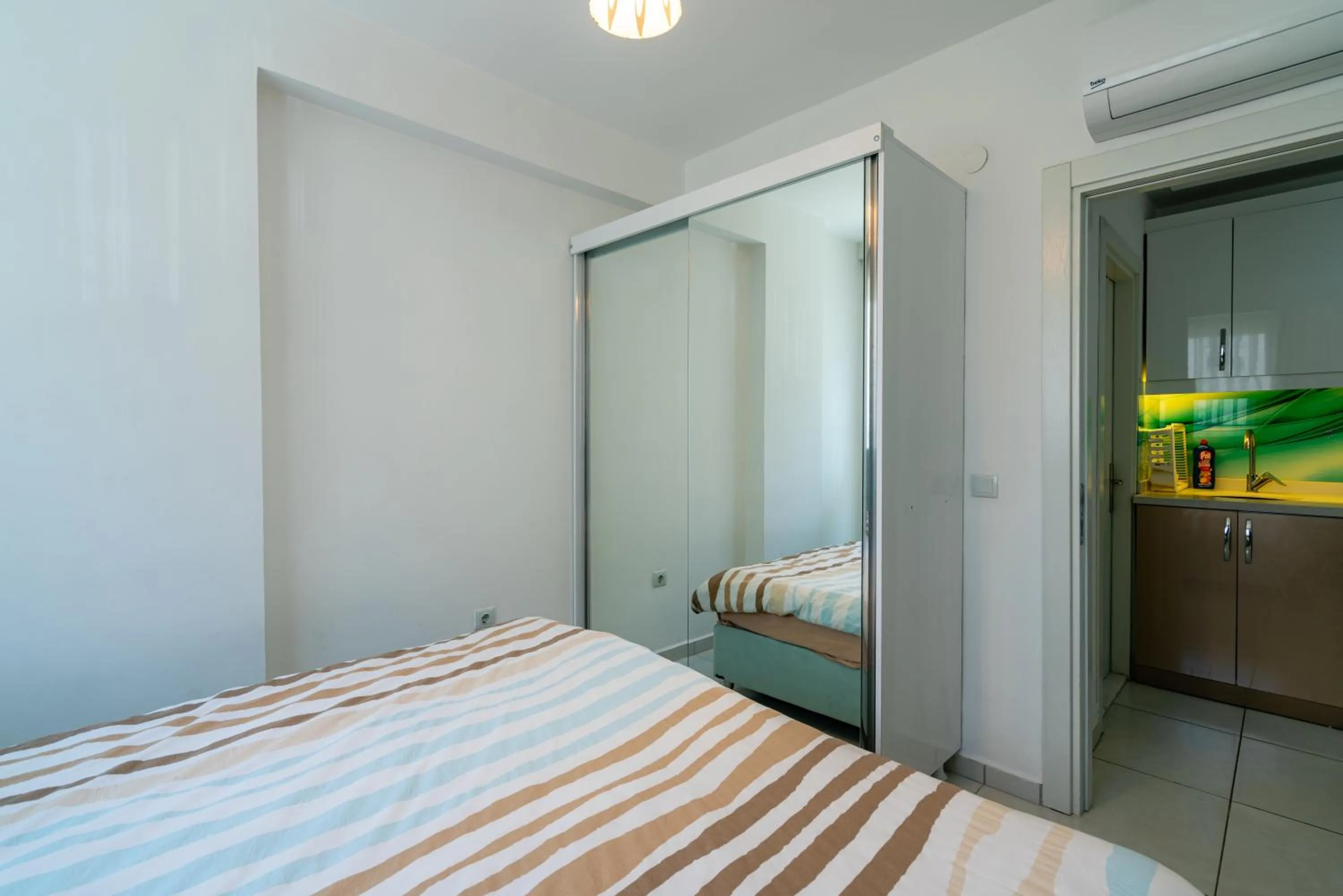 Bed in Sare Suites Downtown