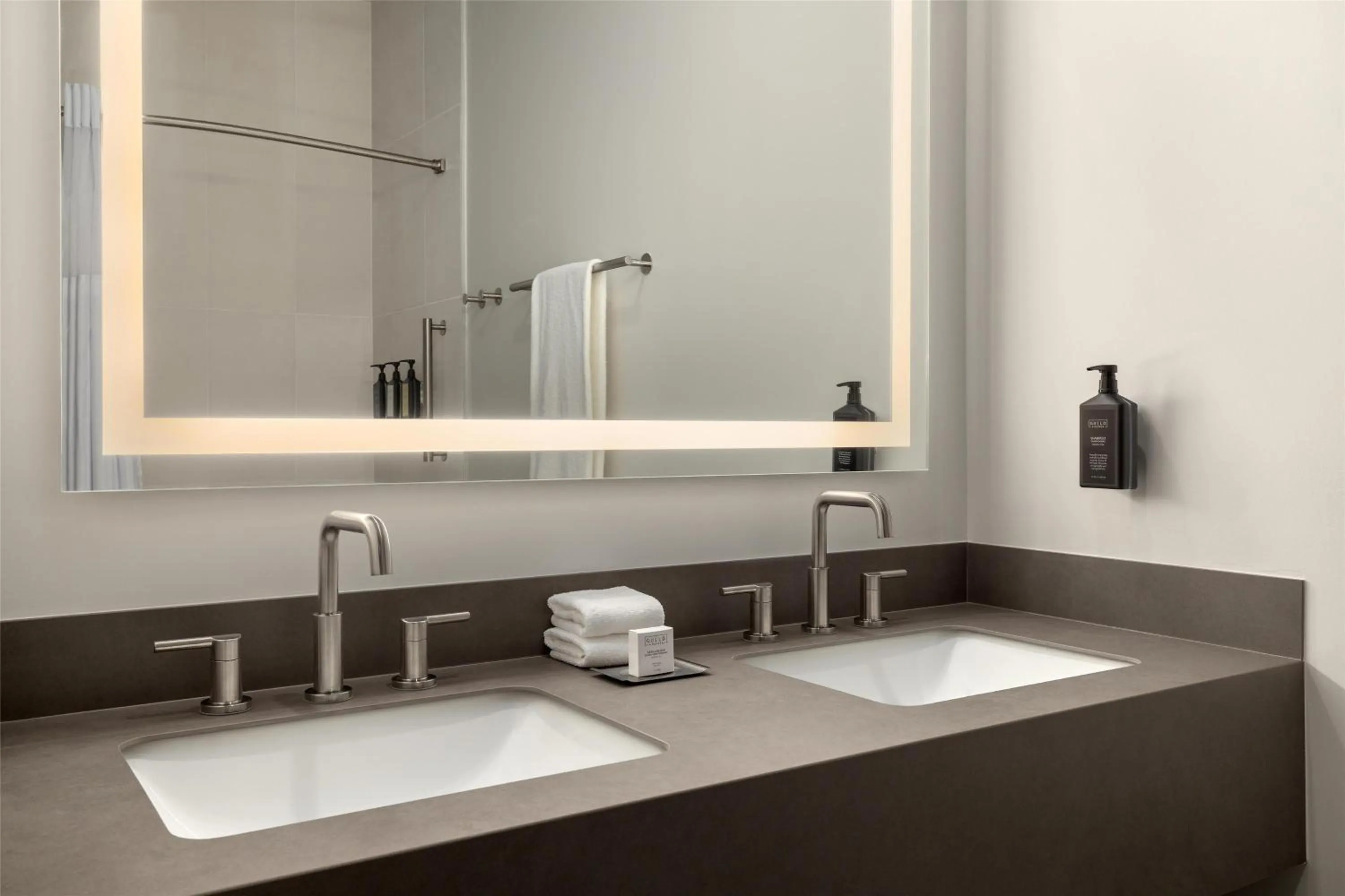 Bathroom in Starlite Yellowstone, Tapestry Collection by Hilton