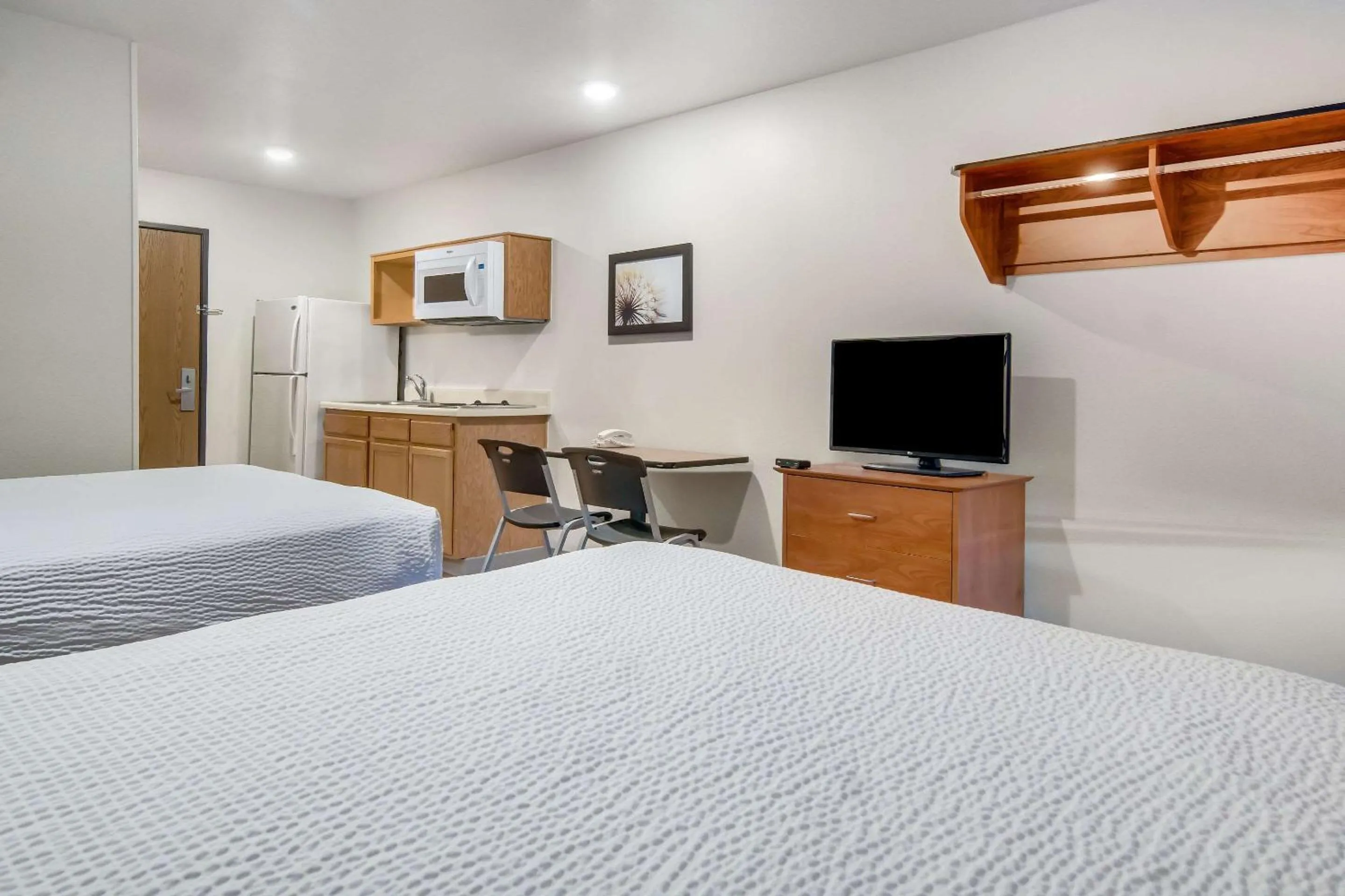 Photo of the whole room, Bed in WoodSpring Suites Abilene
