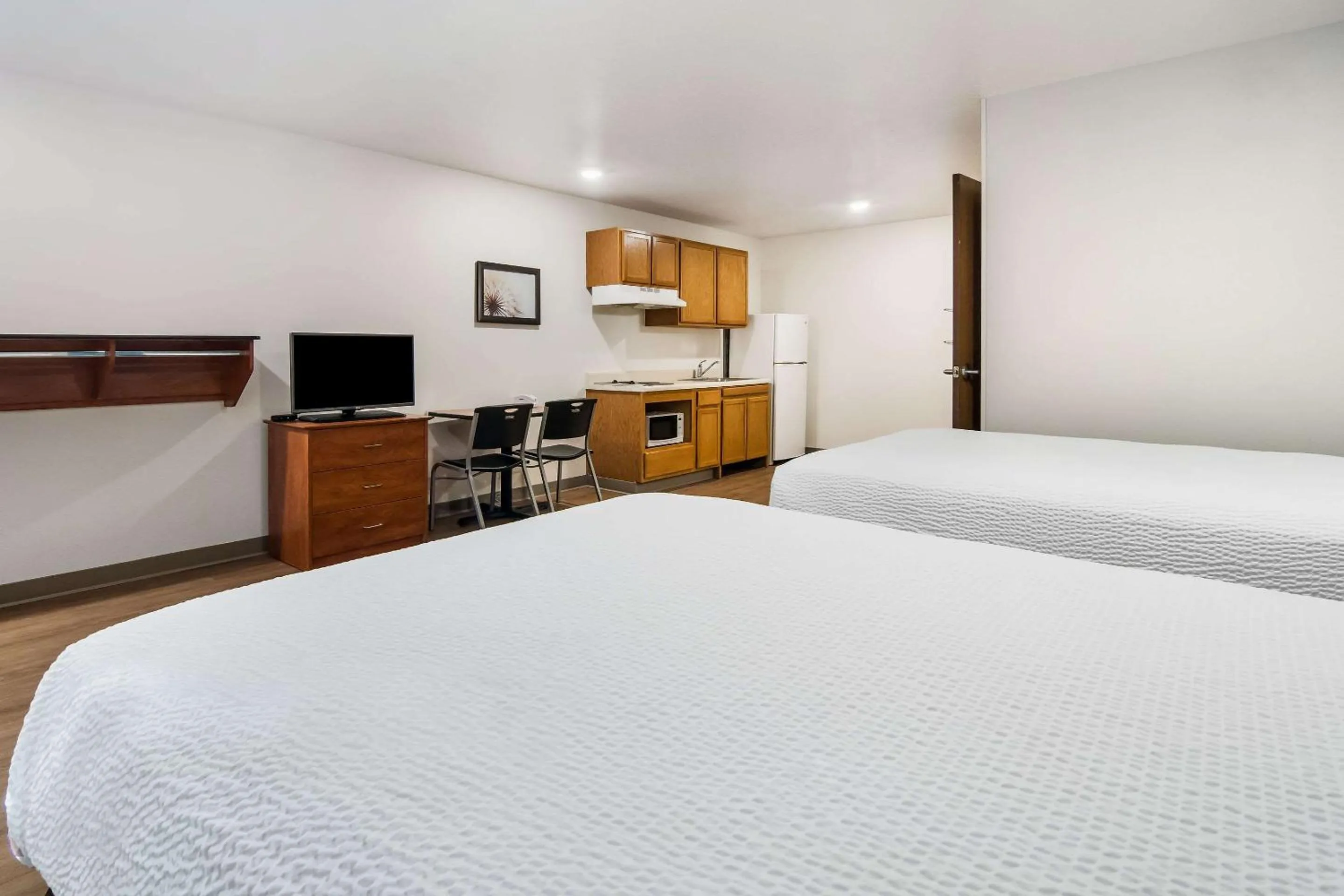 Photo of the whole room, Bed in WoodSpring Suites Abilene