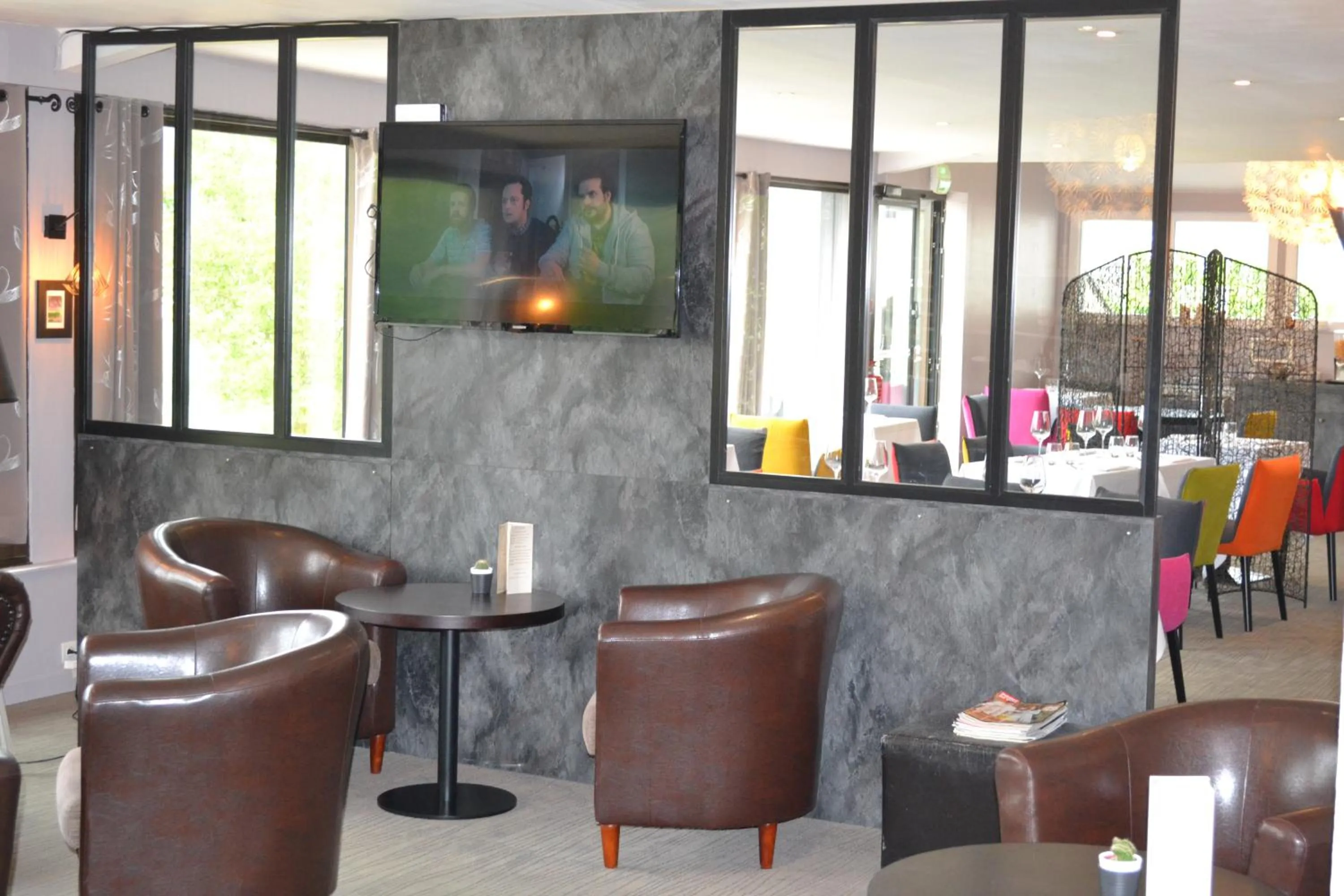 Lounge or bar in The Originals Boutique, Hôtel Les Quatre Salines, Le Mont Saint-Michel Sud