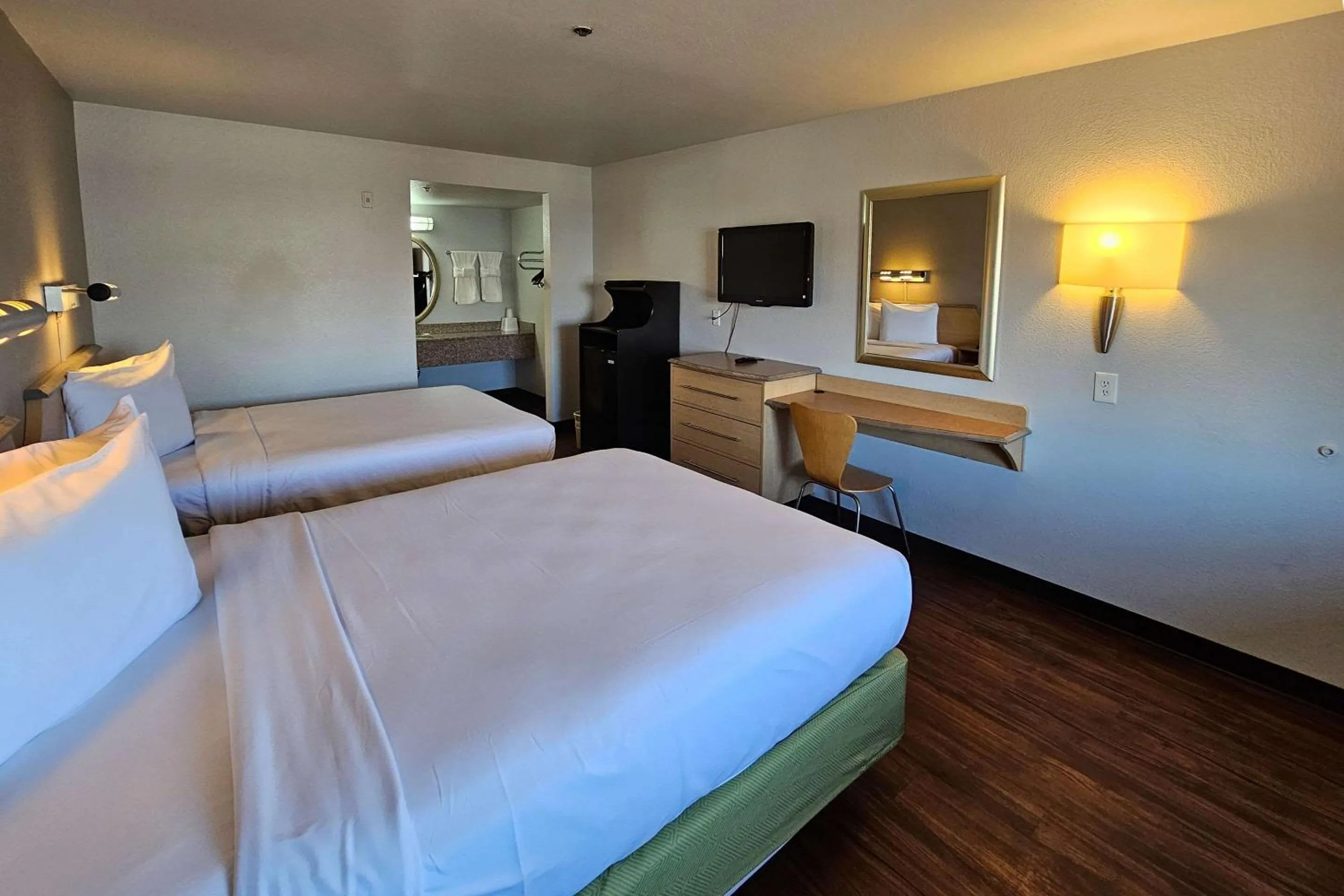 Quadruple Room with Two Queen Beds and Roll-In Shower - Disability Access/Non Smoking in Rodeway Inn & Suites Thousand Palms - Rancho Mirage