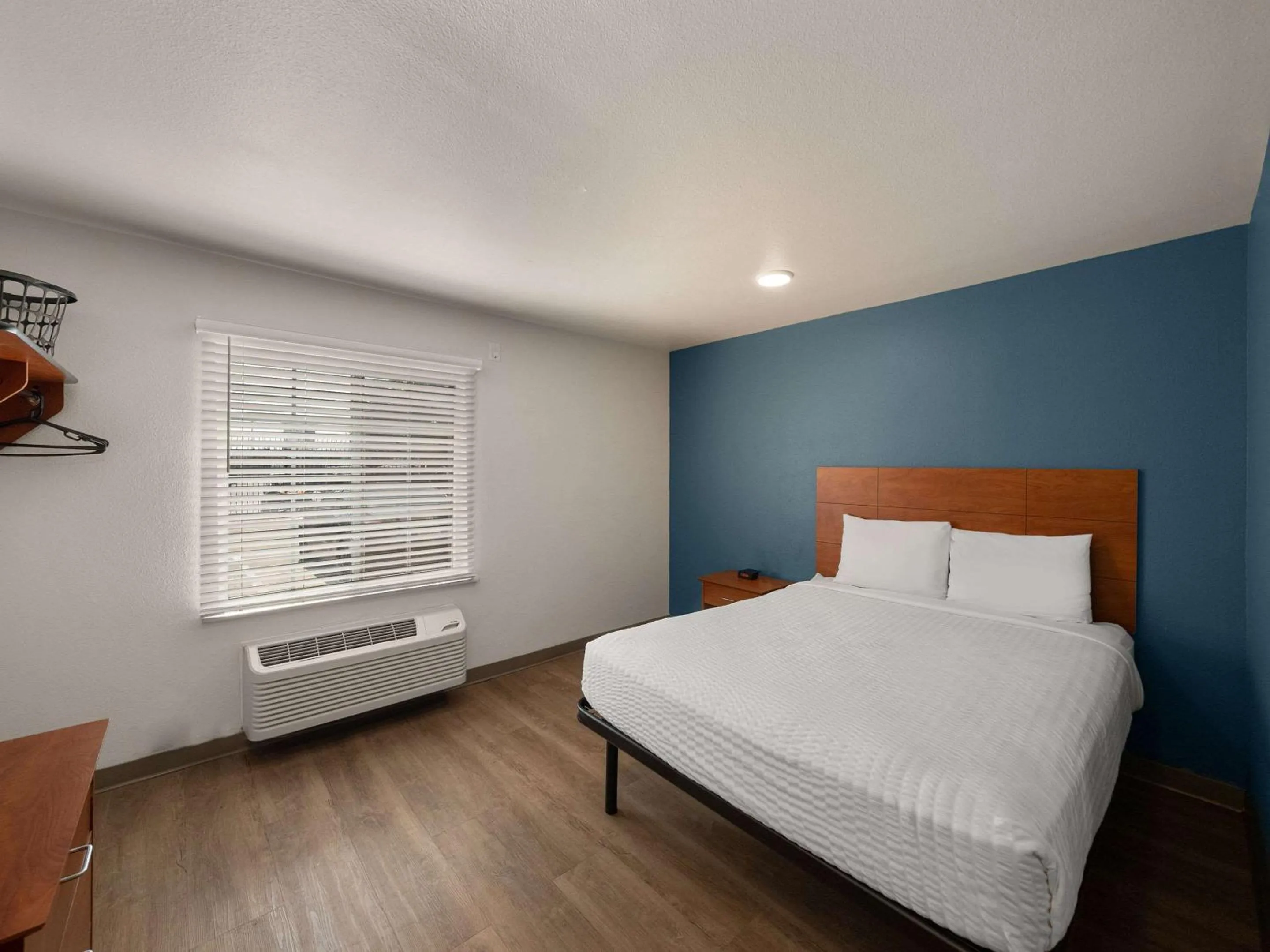 Bedroom, Bed in WoodSpring Suites Dallas Rockwall