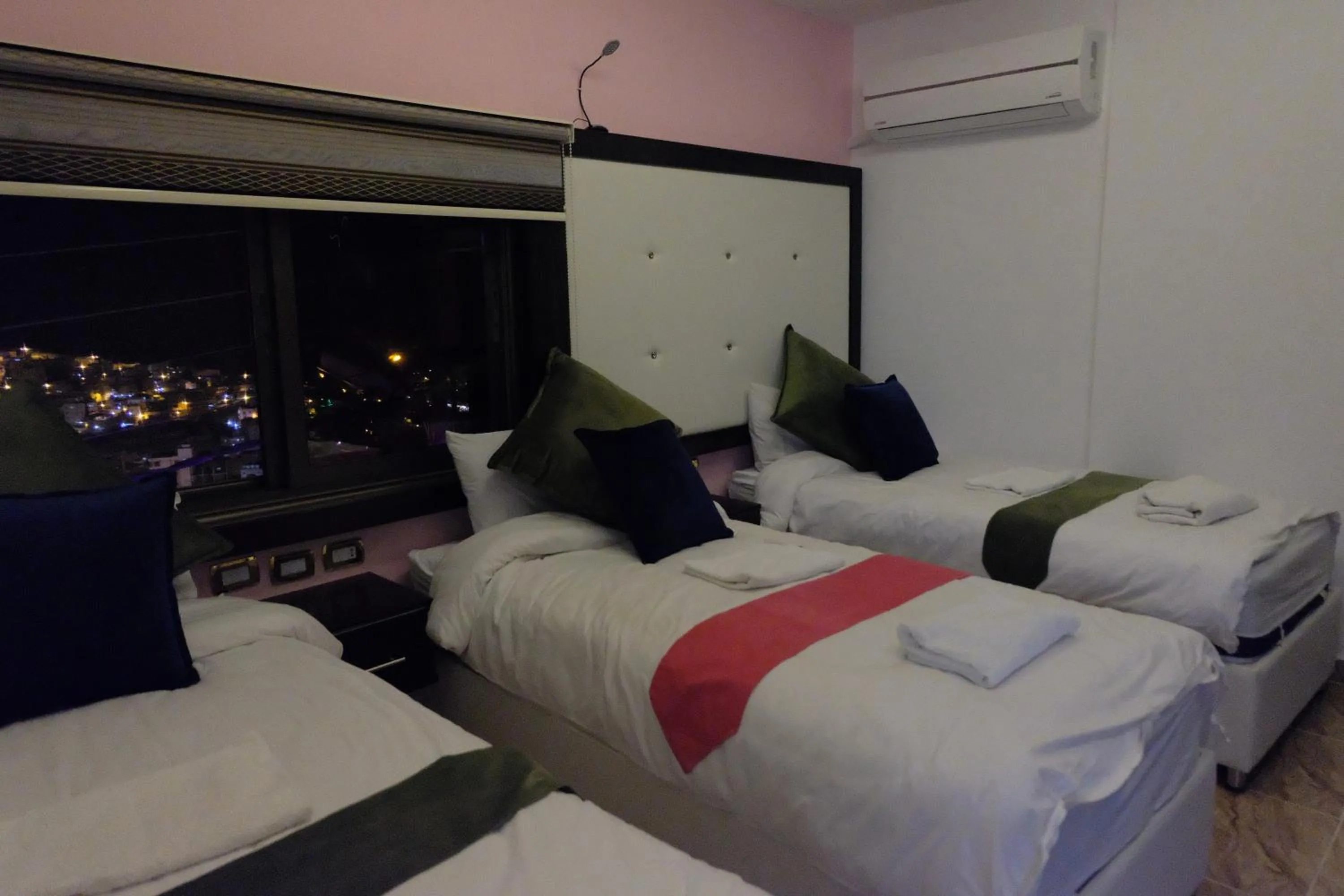 Bed in Petra Guests Hotel