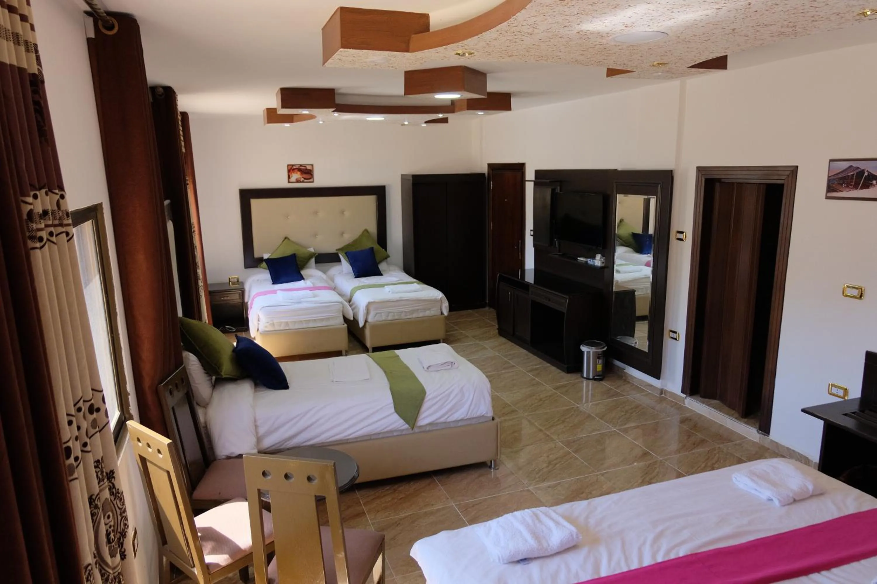 Photo of the whole room, Bed in Petra Guests Hotel