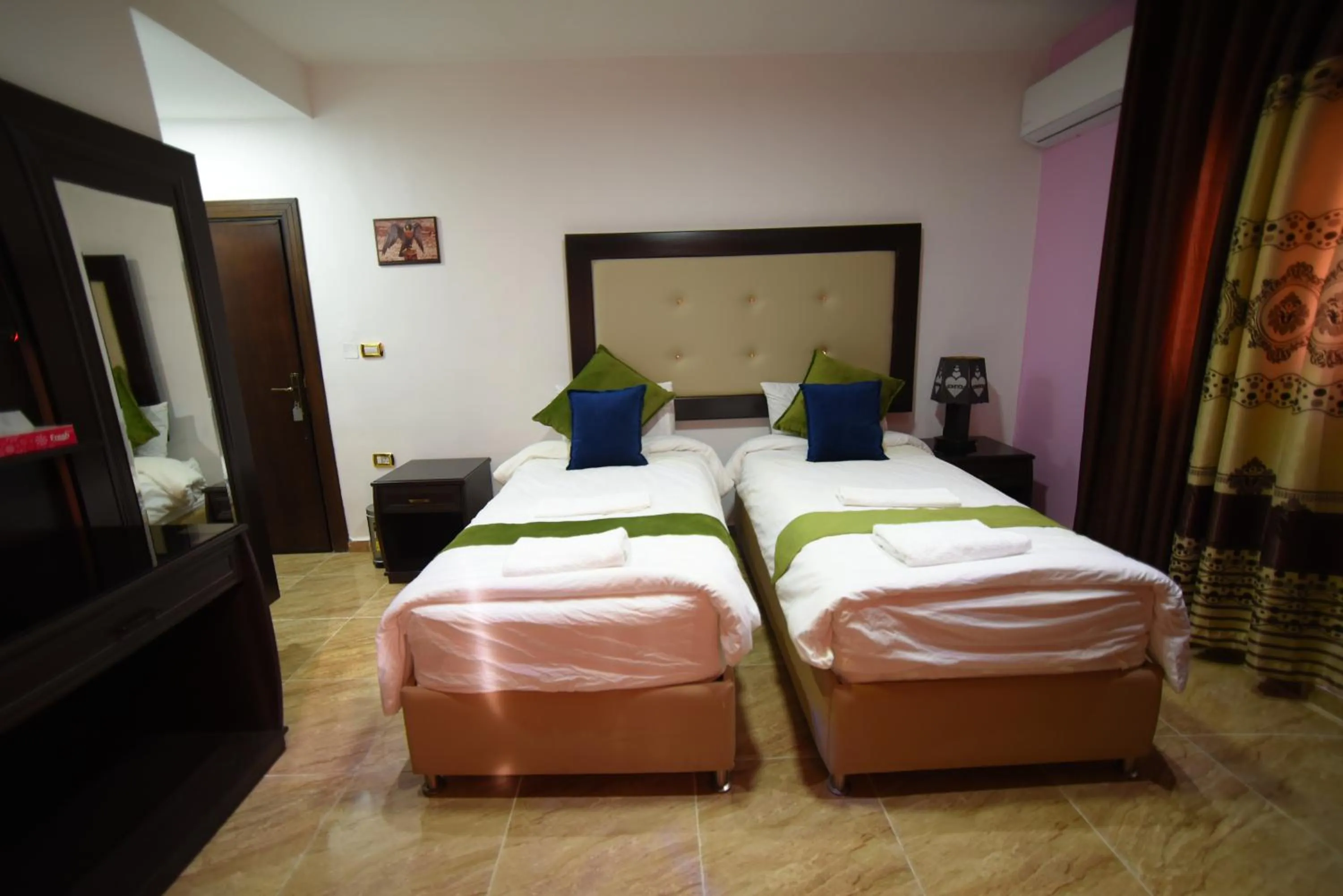 Bed in Petra Guests Hotel