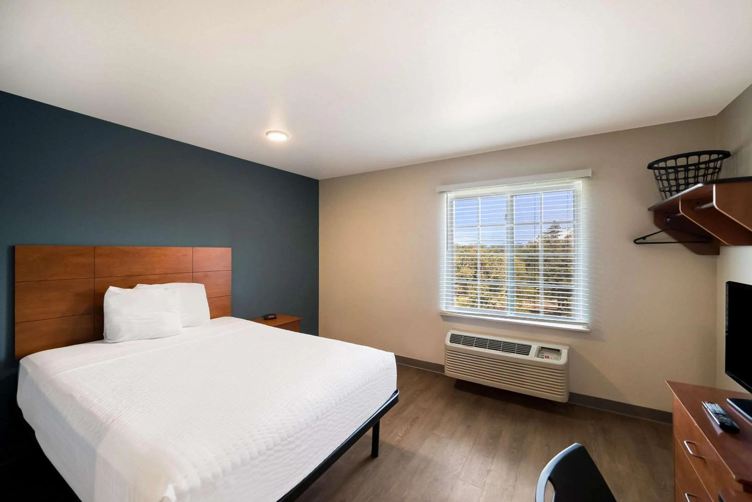 Bedroom, Bed in WoodSpring Suites Fort Worth Fossil Creek