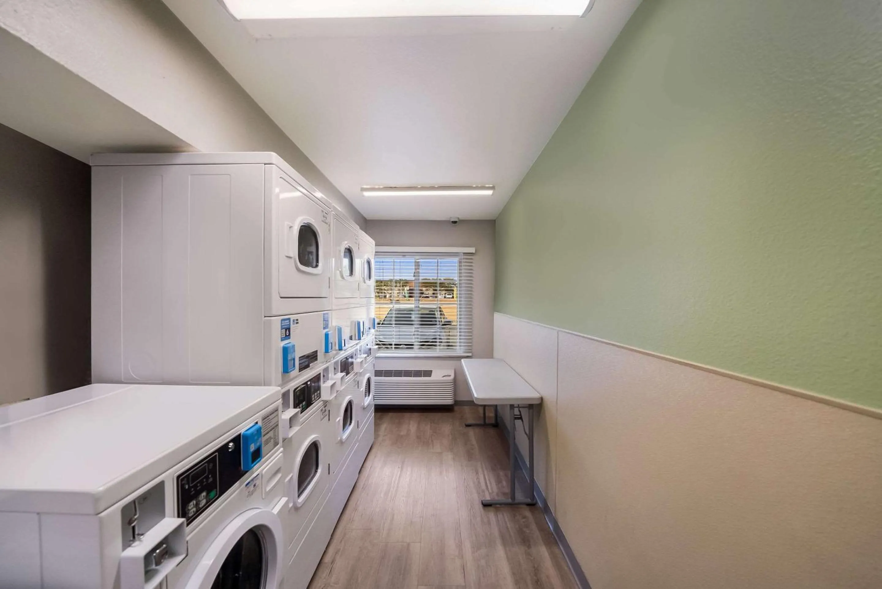 laundry in WoodSpring Suites Fort Worth Fossil Creek