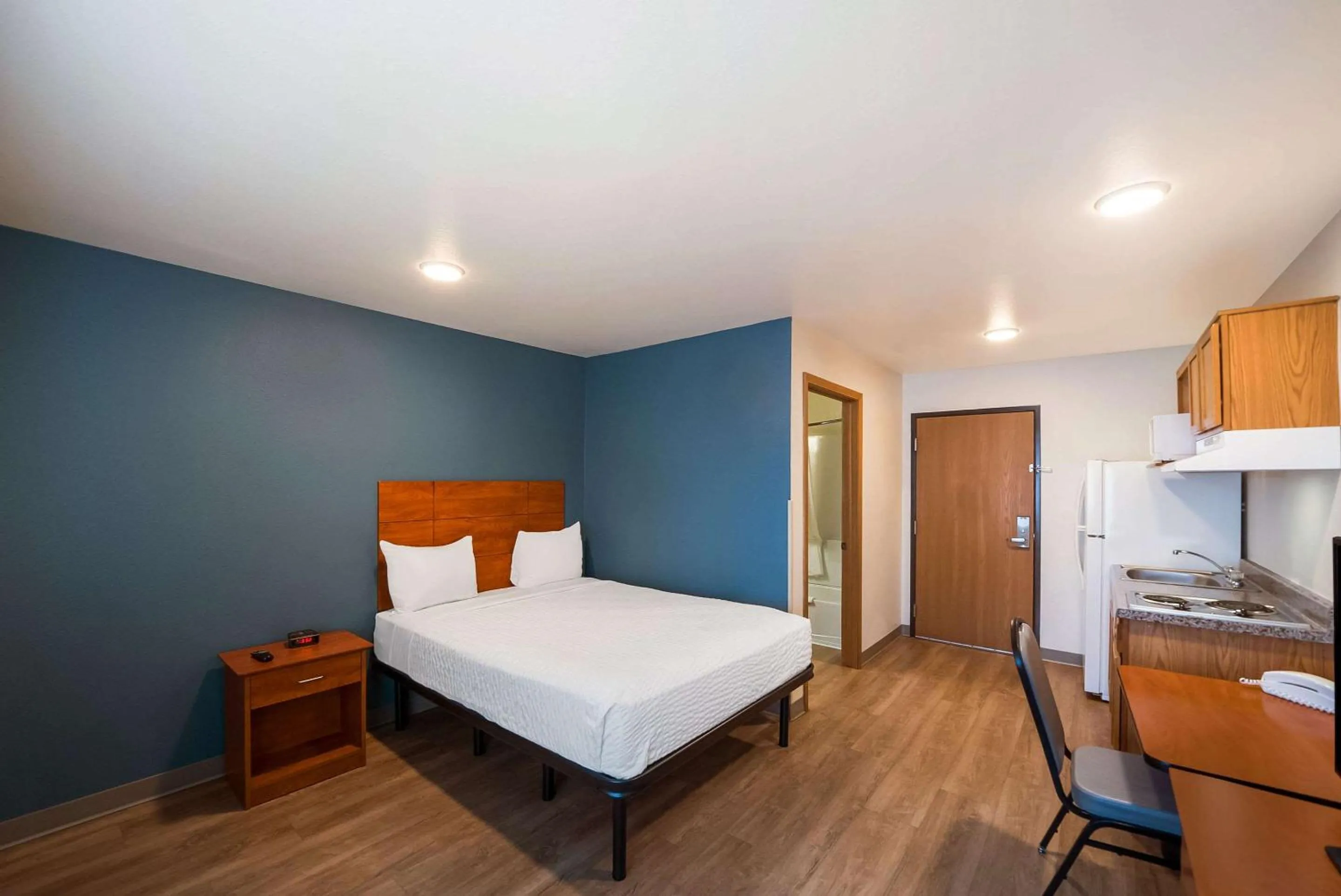 Bedroom, Bed in WoodSpring Suites Fort Worth Fossil Creek