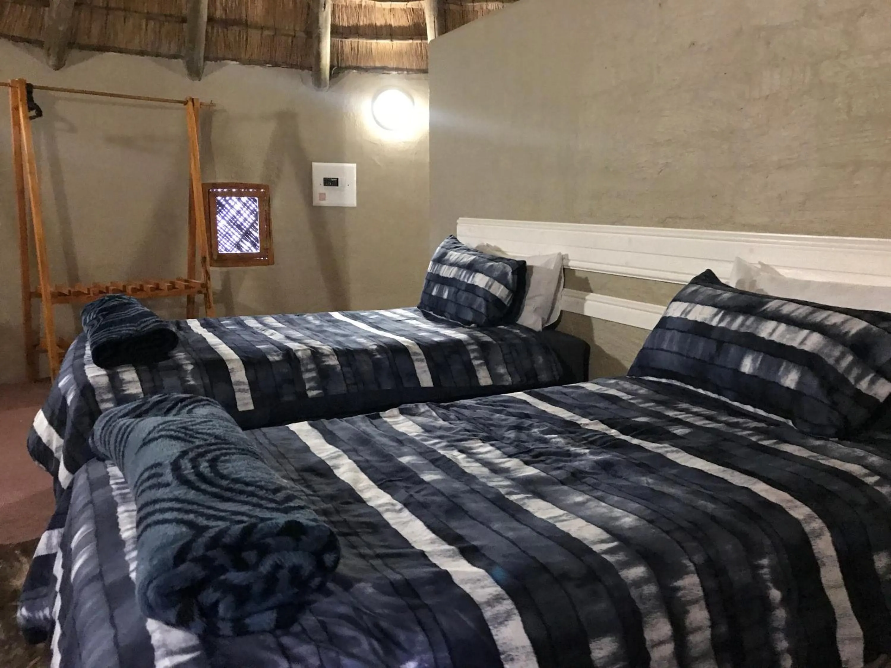 Bed in Kwakunje Guest Lodge