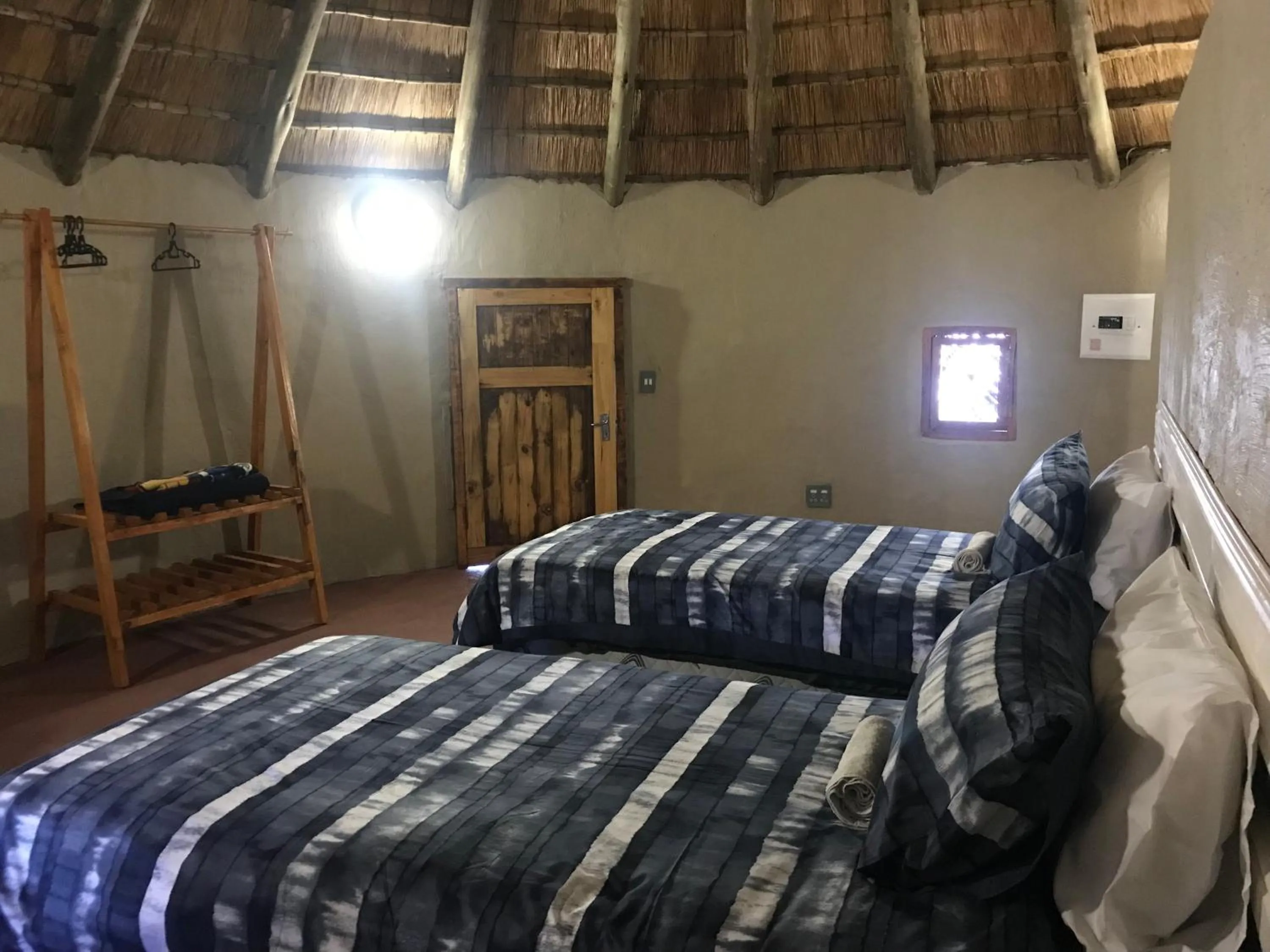 Bed in Kwakunje Guest Lodge