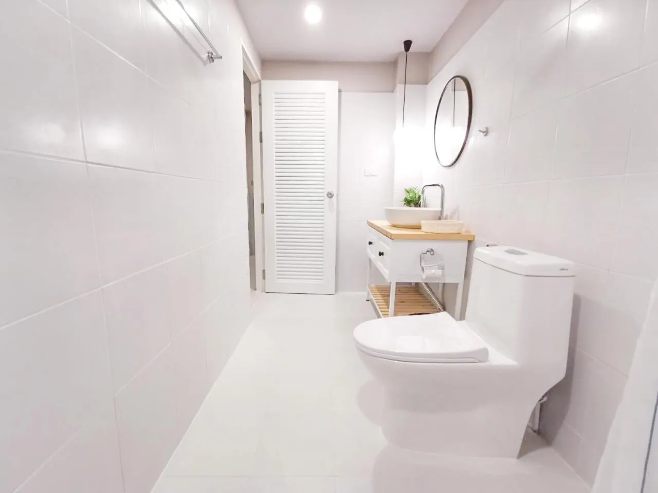 Toilet in Snoozy Guesthouse