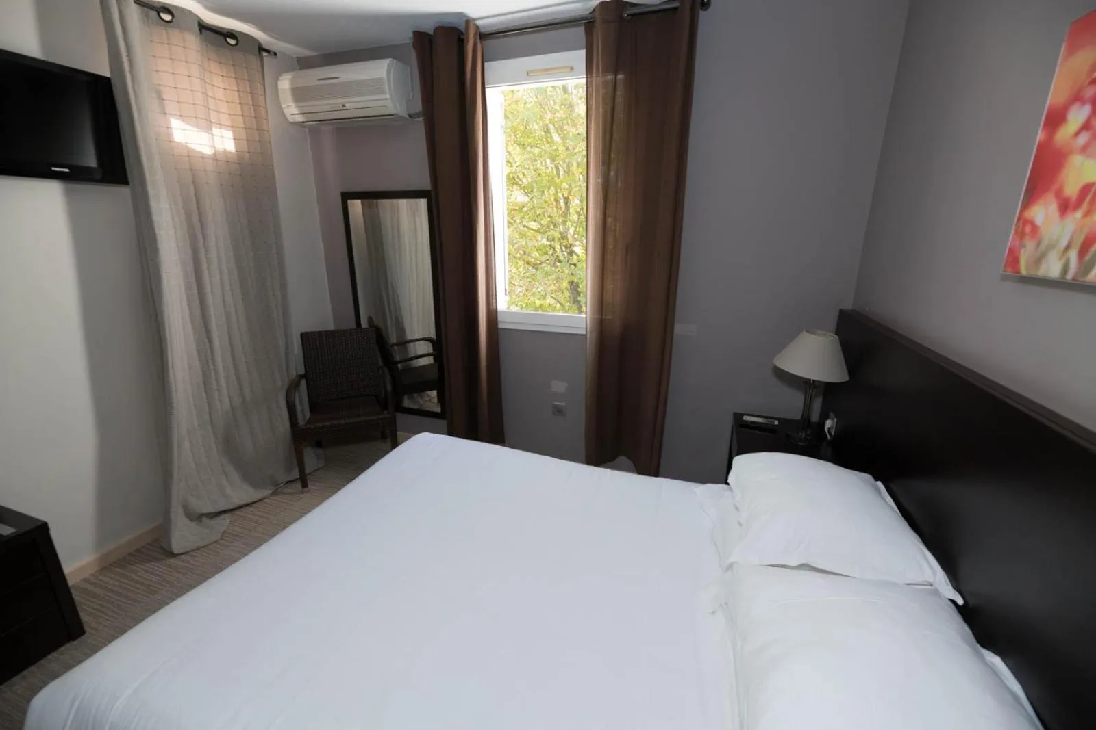 Bed in SOWELL HOTELS Domaine de la Petite Isle