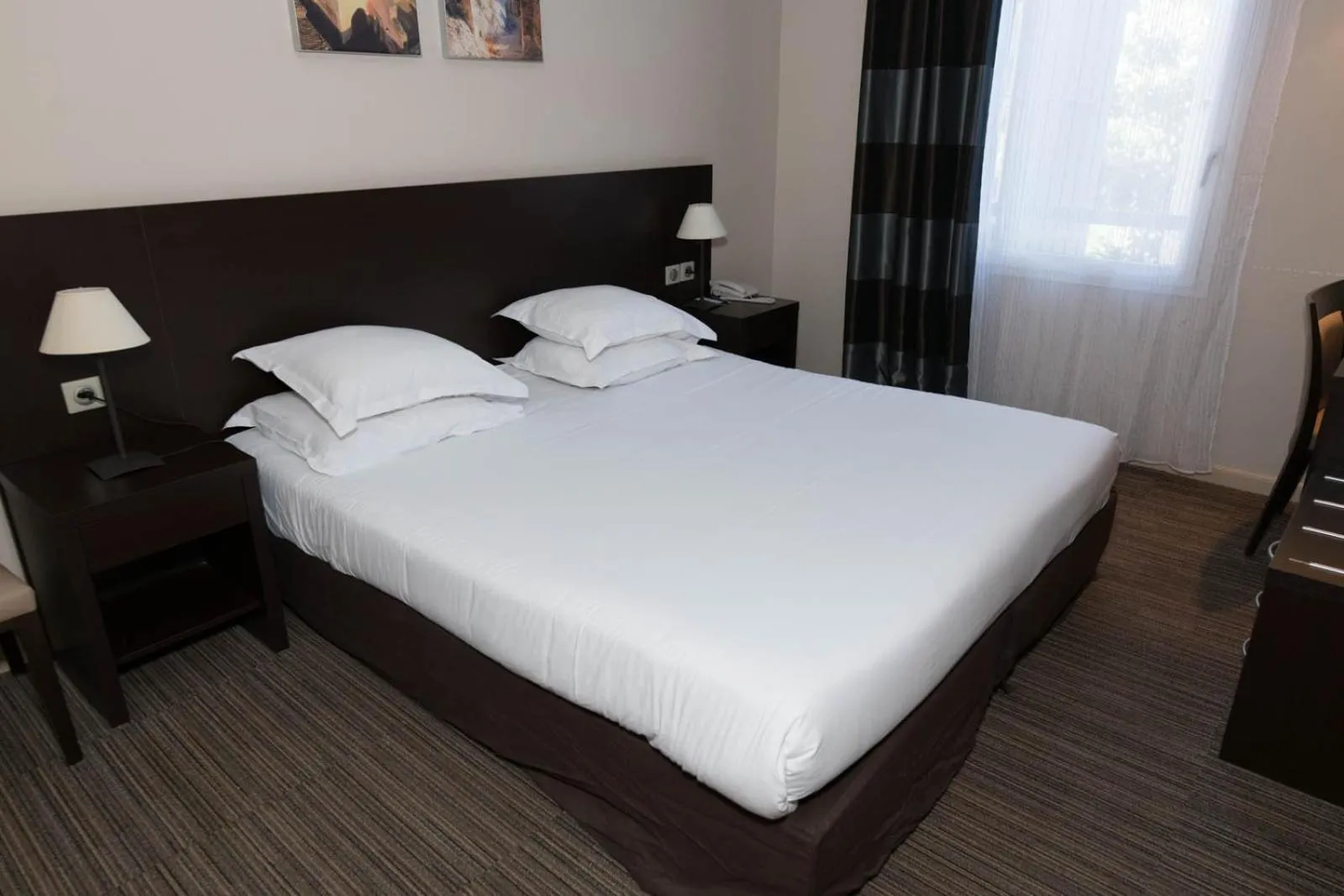 Bed in SOWELL HOTELS Domaine de la Petite Isle