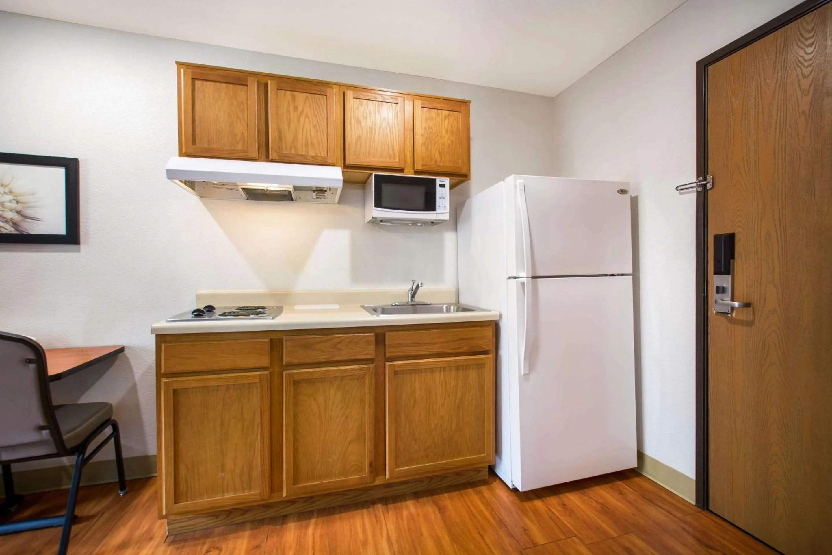 Bedroom in WoodSpring Suites Louisville Southeast
