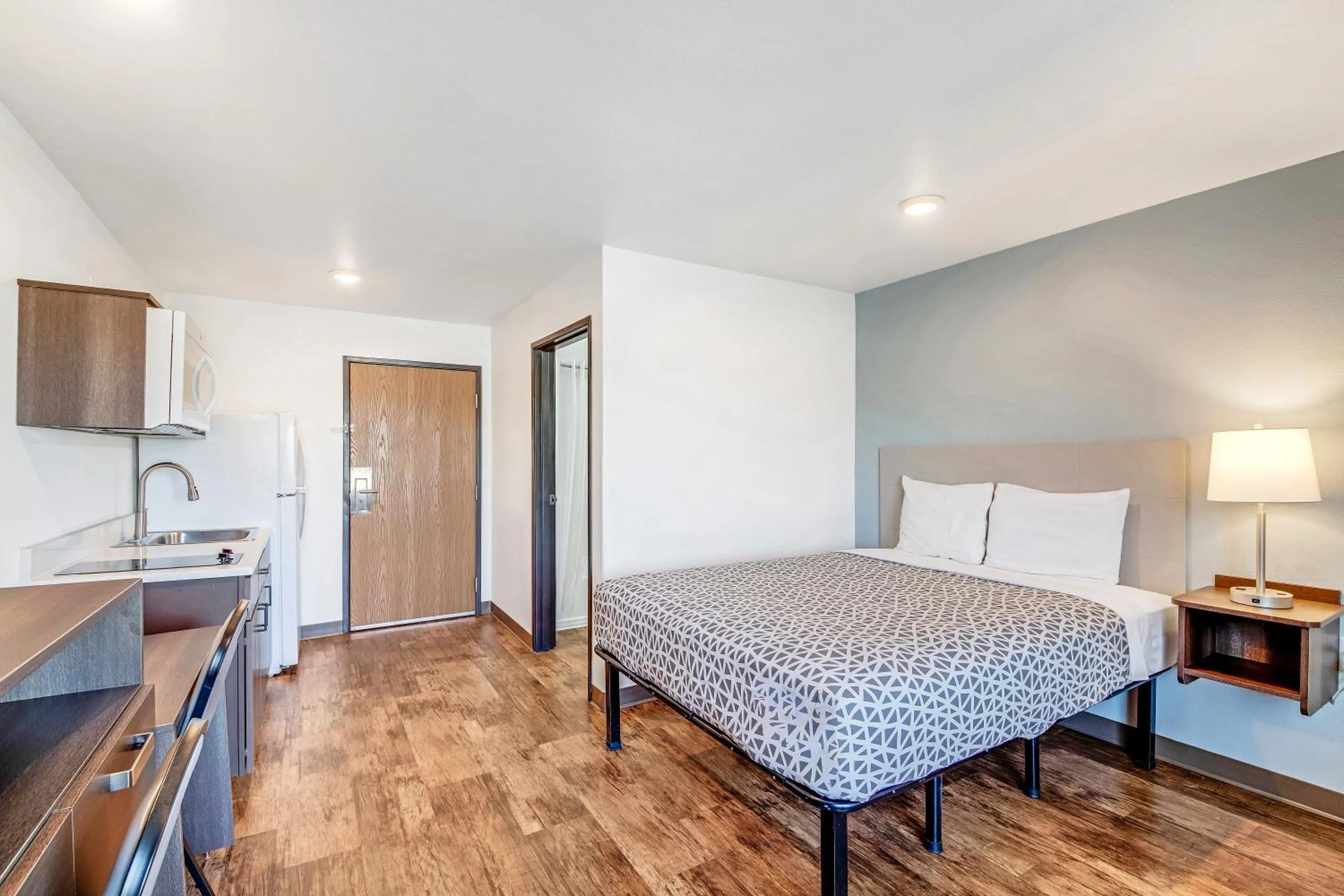 Photo of the whole room, Bed in WoodSpring Suites Austin North I-35