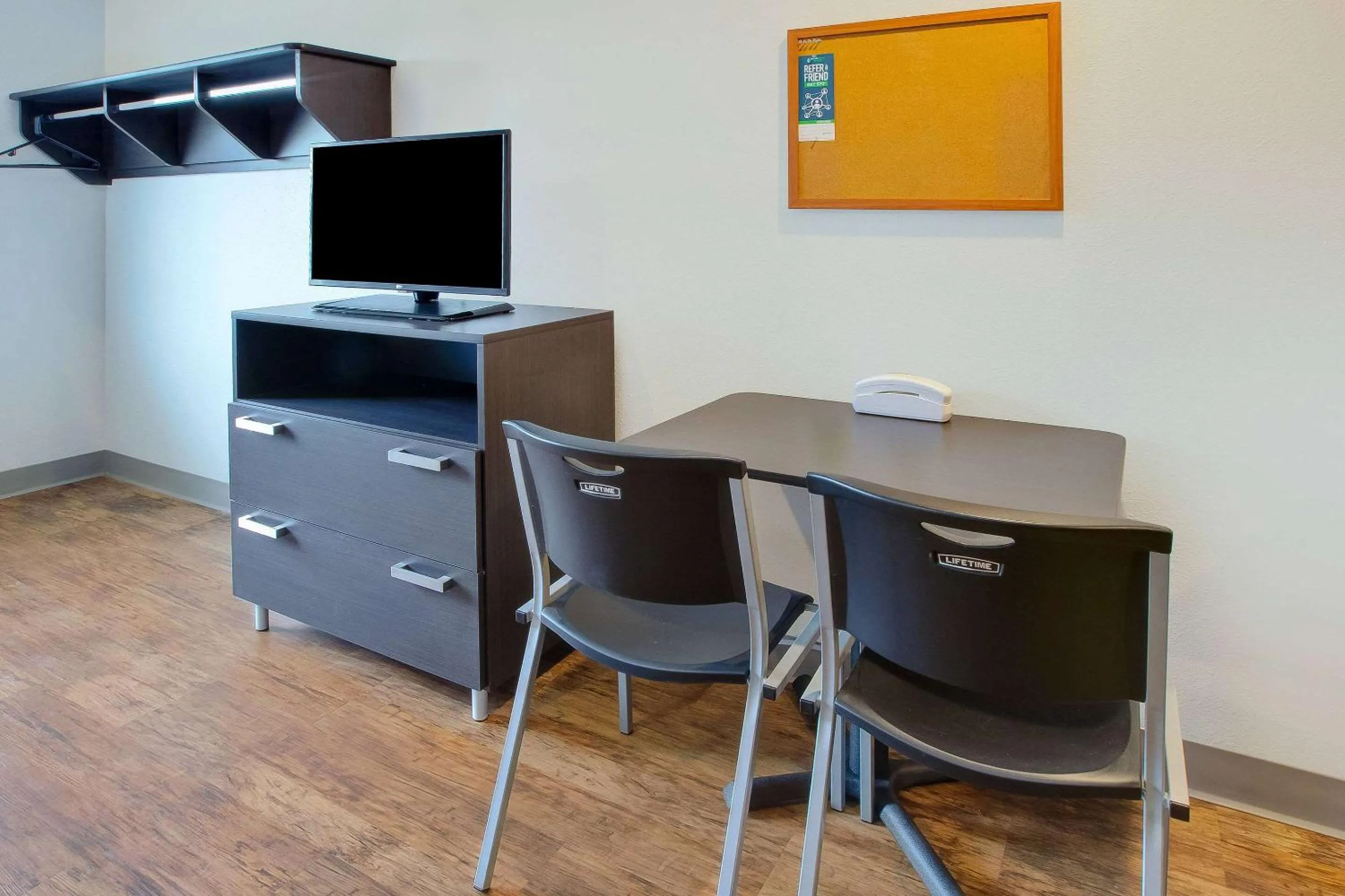 Bedroom in WoodSpring Suites St Louis St Charles