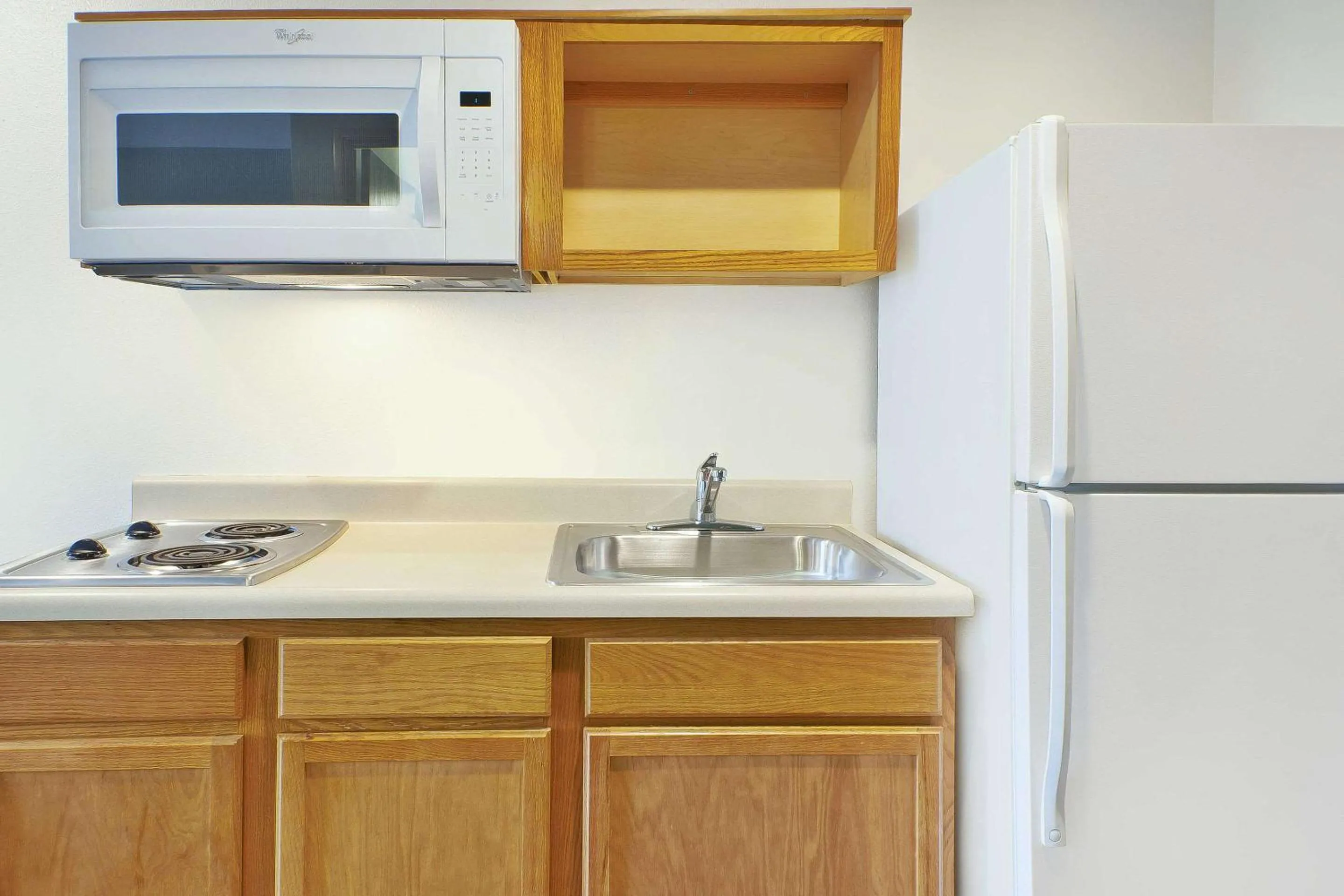 Bedroom in WoodSpring Suites St Louis St Charles