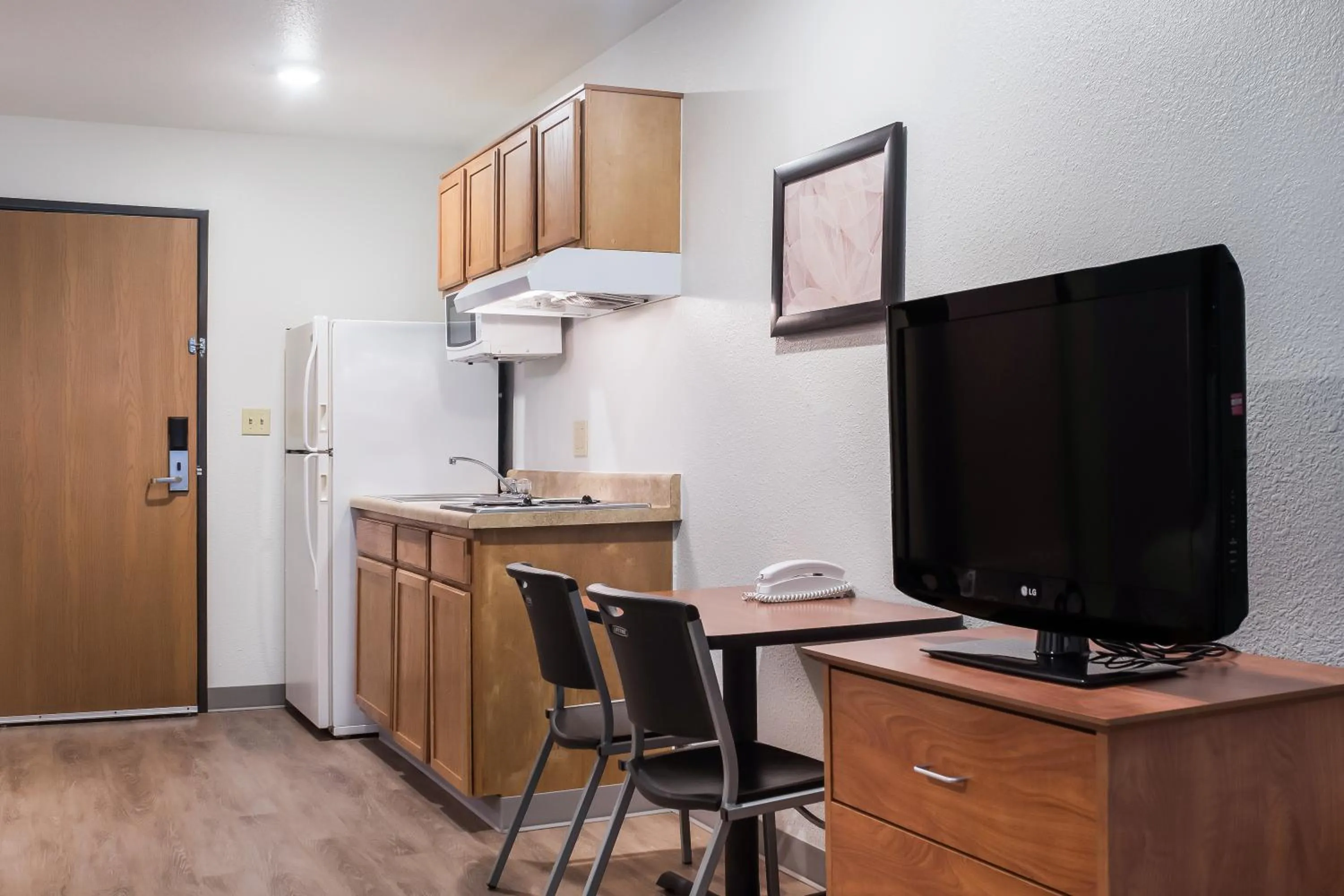 kitchen in WoodSpring Suites Conroe
