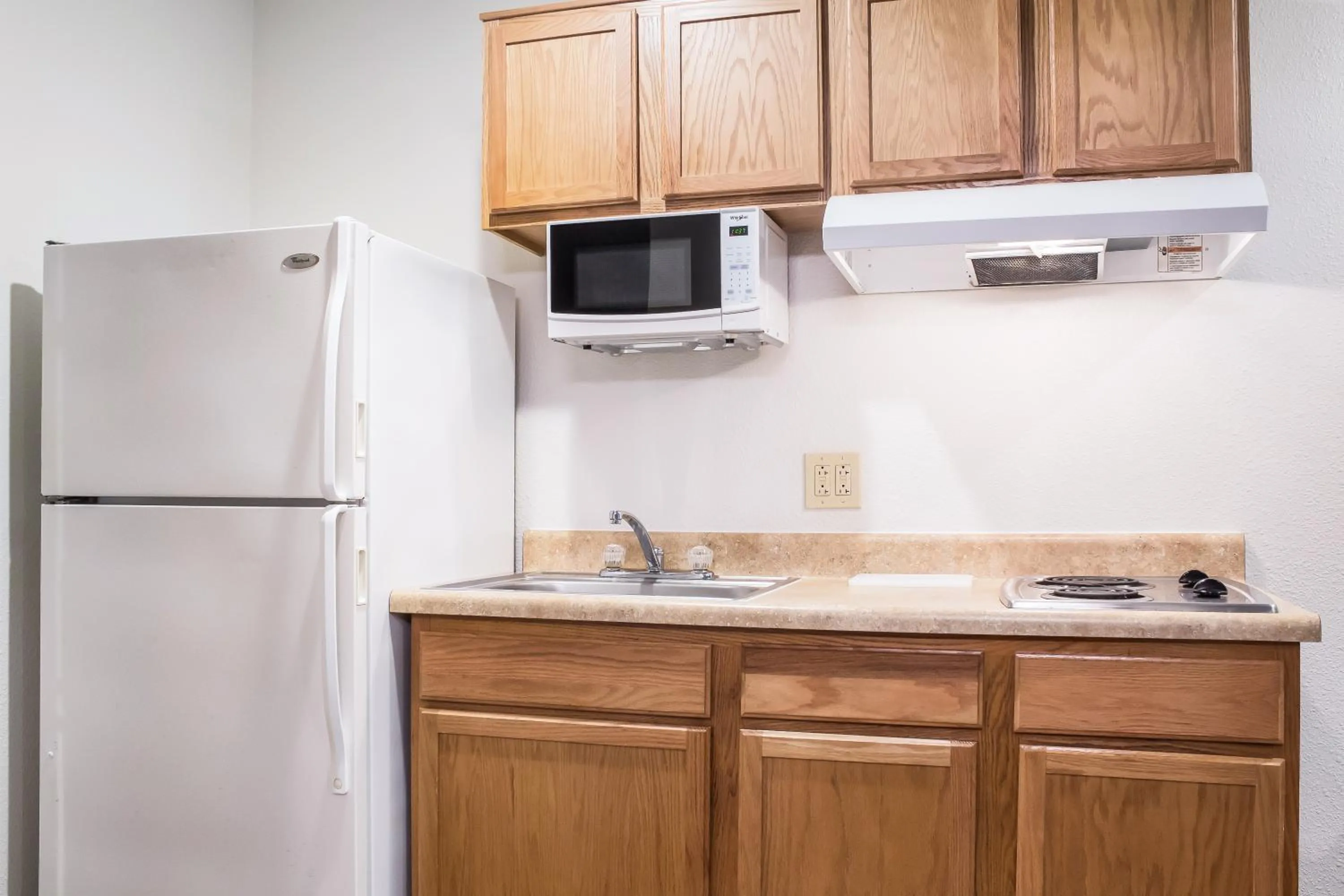 kitchen in WoodSpring Suites Conroe