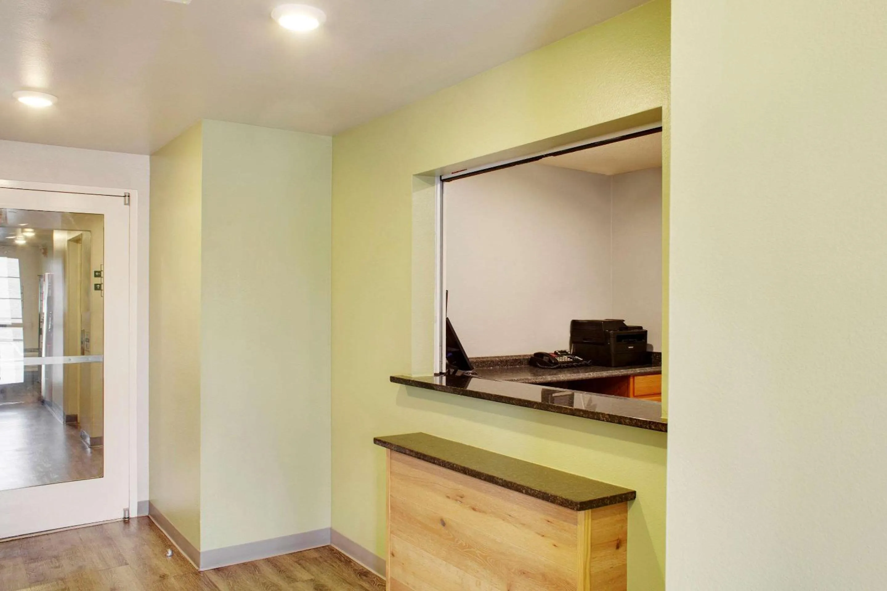 Lobby or reception in WoodSpring Suites Conroe