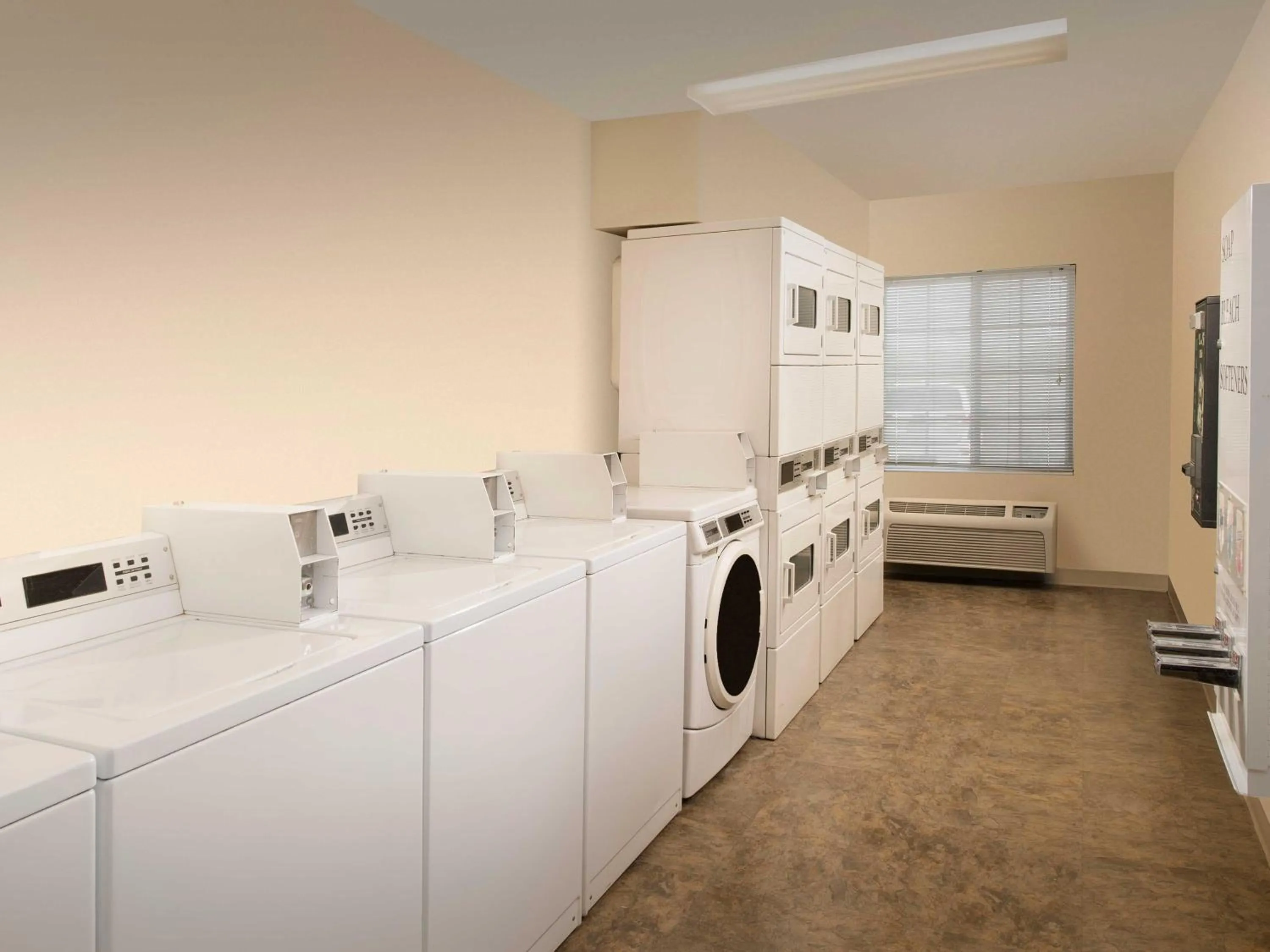 laundry in WoodSpring Suites Omaha Bellevue, an Extended Stay Hotel