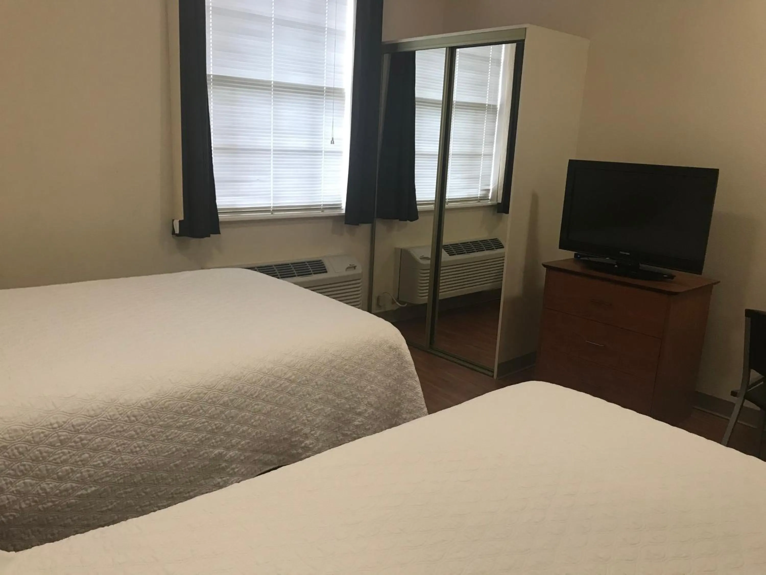 Living room, Bed in Best Studio Inn Homestead (Extended Stay)