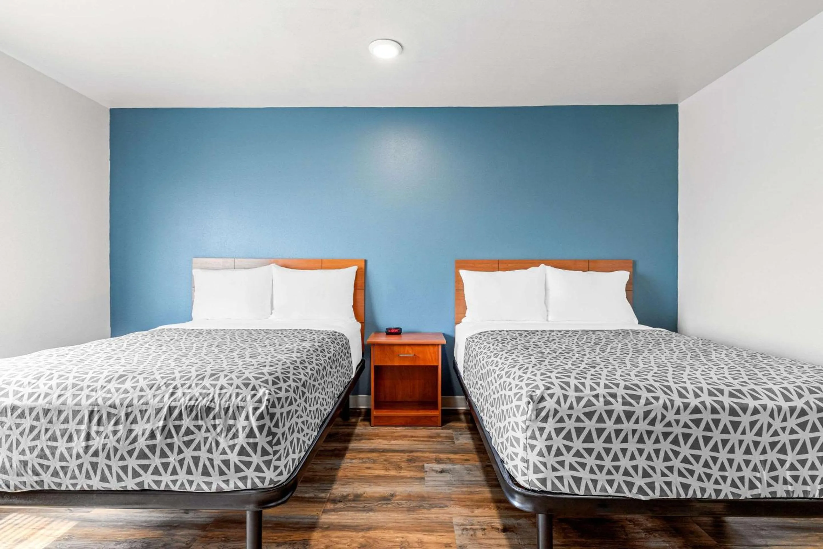 Bedroom, Bed in WoodSpring Suites Tulsa