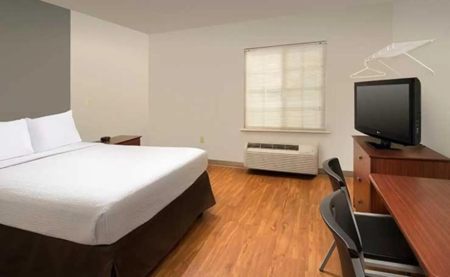 Photo of the whole room, Bed in WoodSpring Suites Council Bluffs