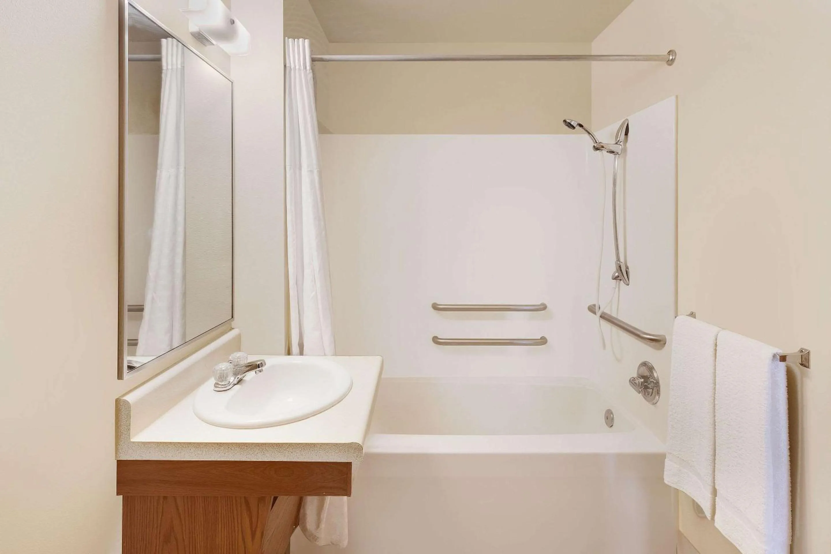 Bathroom in WoodSpring Suites Council Bluffs