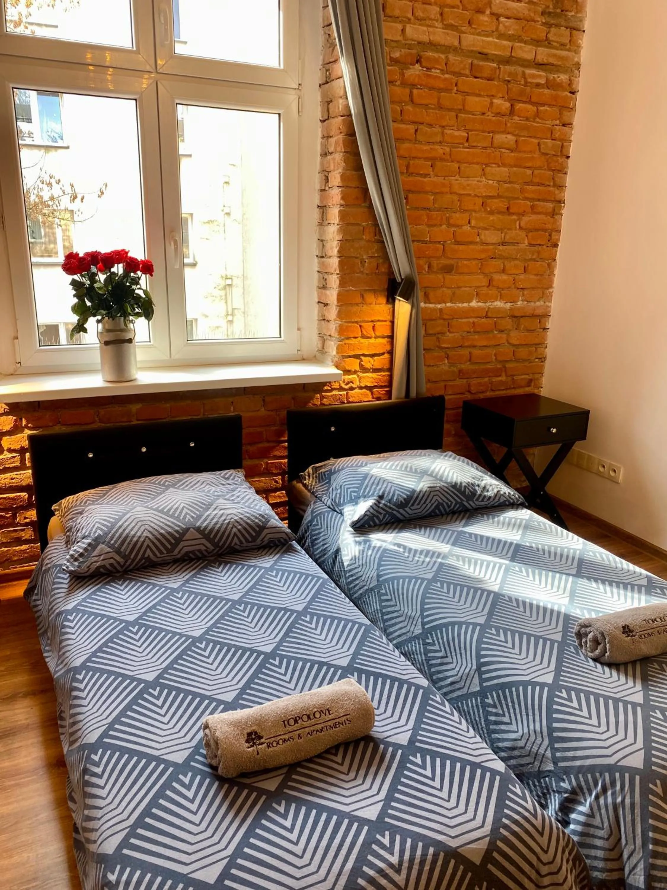 Bed in Topolove Rooms & Apartments