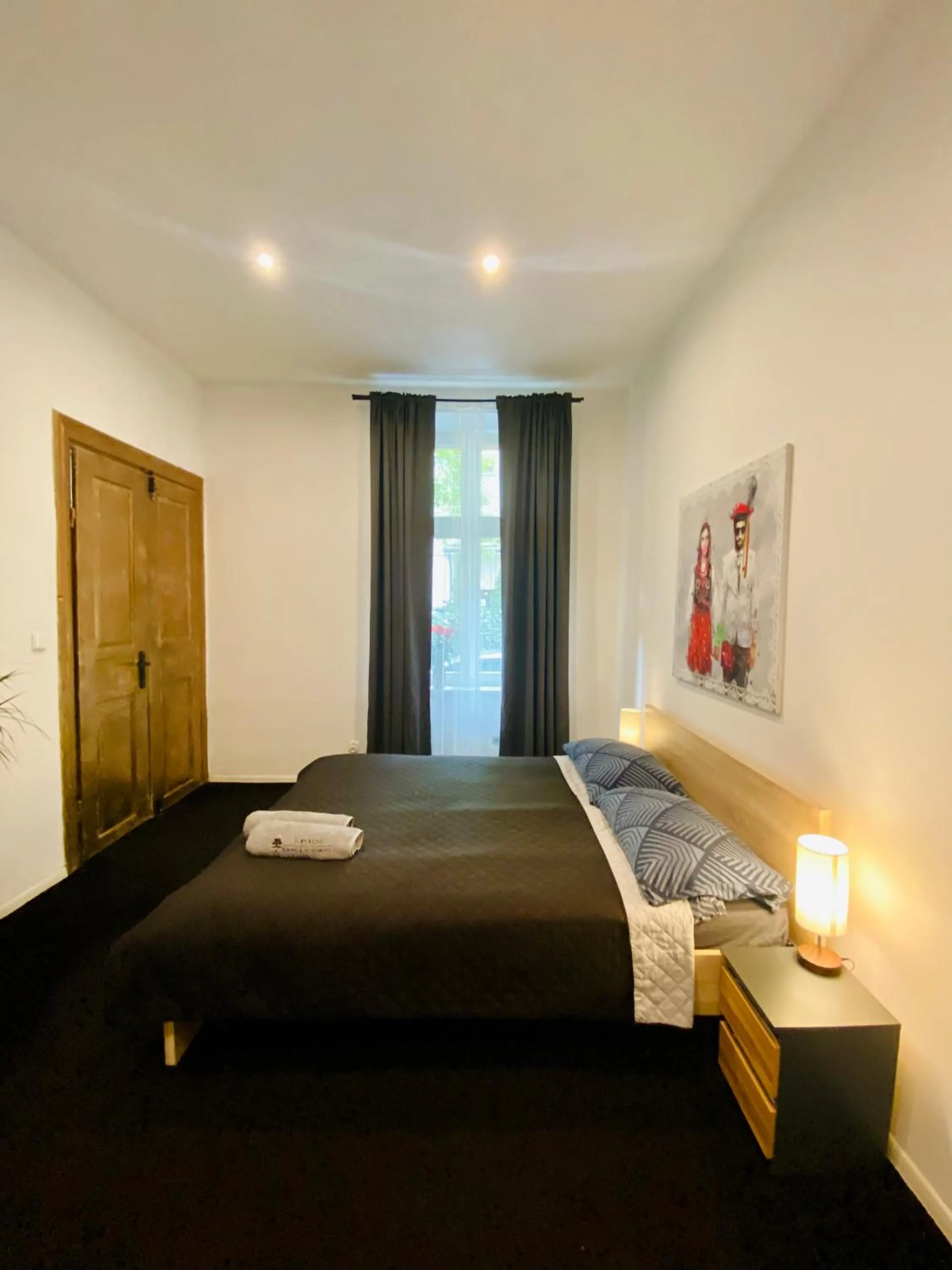 Bed in Topolove Rooms & Apartments