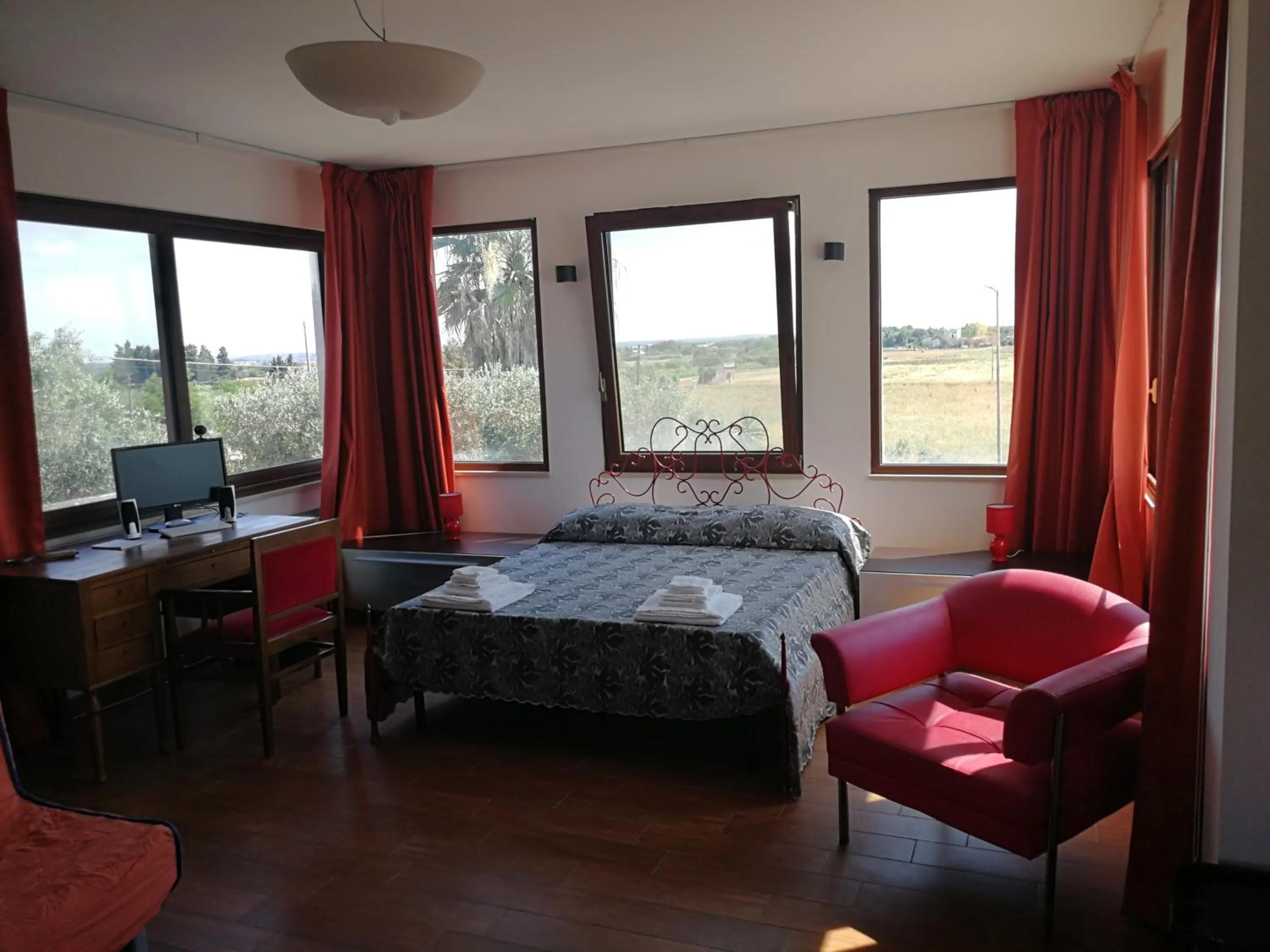 Photo of the whole room, Bed in Il Giardino degli Ulivi