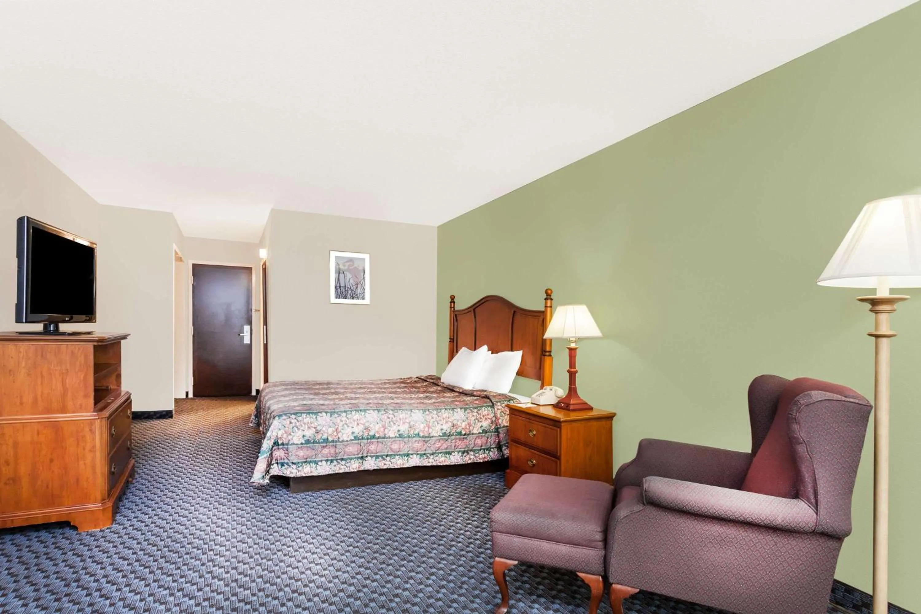 Photo of the whole room in Days Inn & Suites by Wyndham SE Columbia Ft Jackson