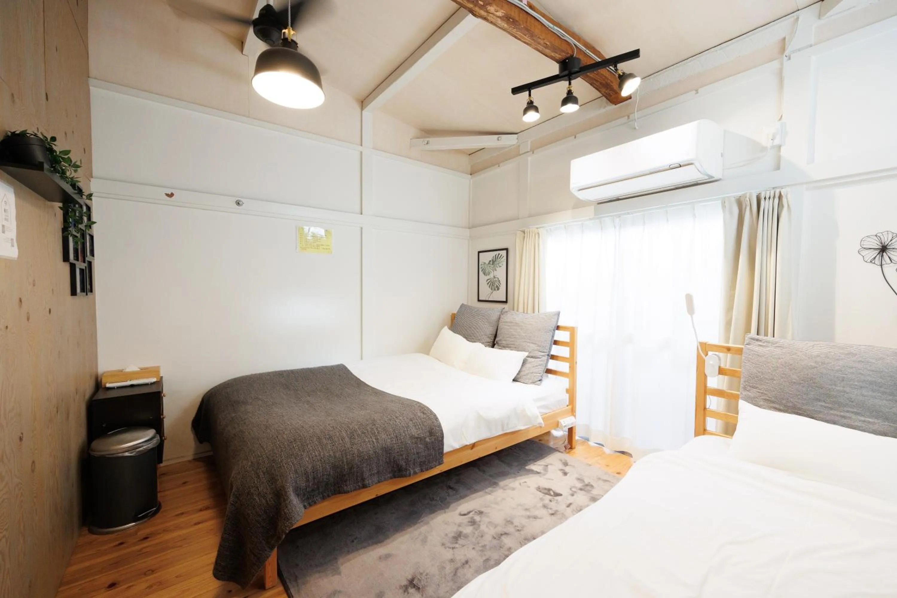 Bed in SMILE STAY Shinnakano